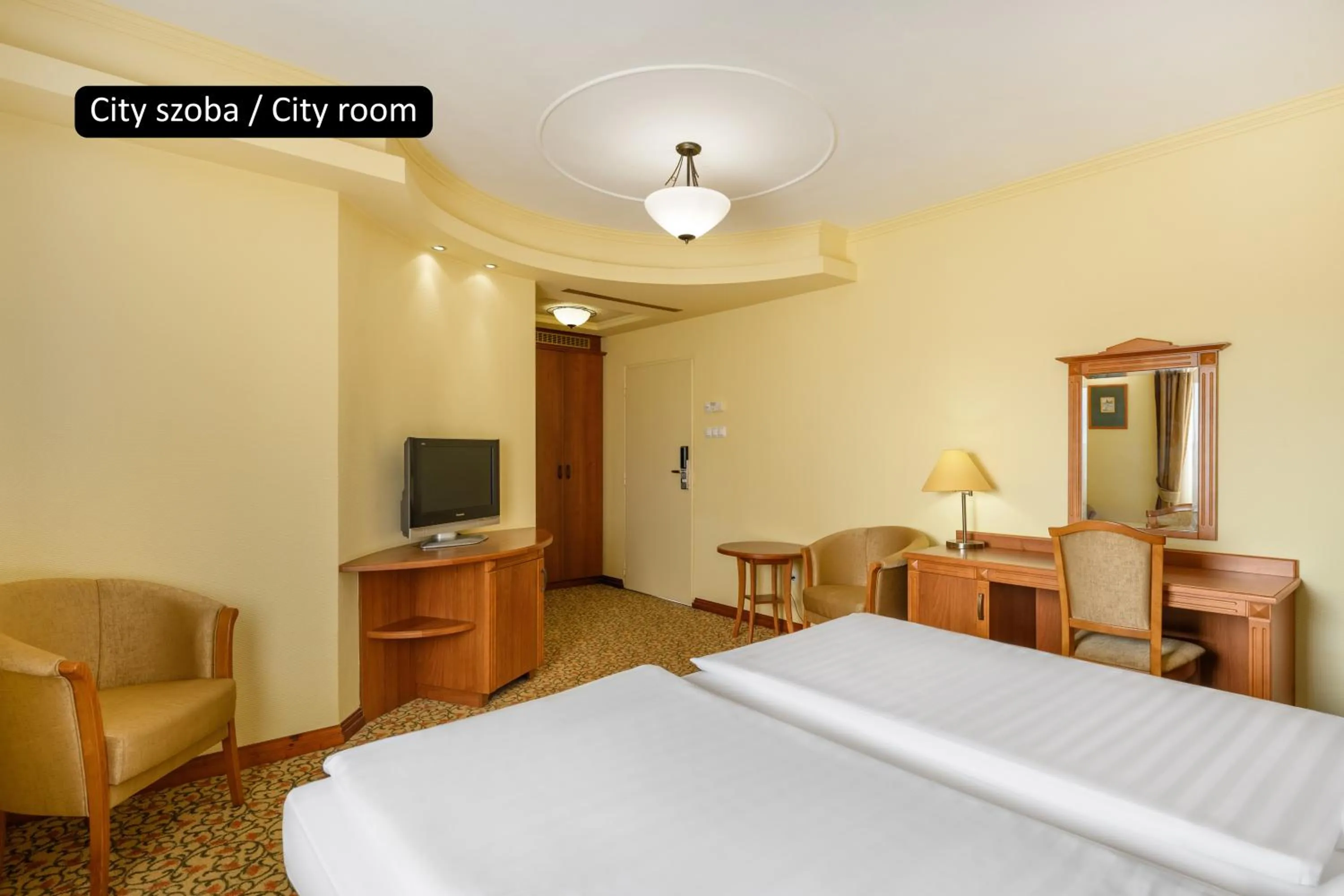 Bed in Aranyhomok Hotel Business & Relax