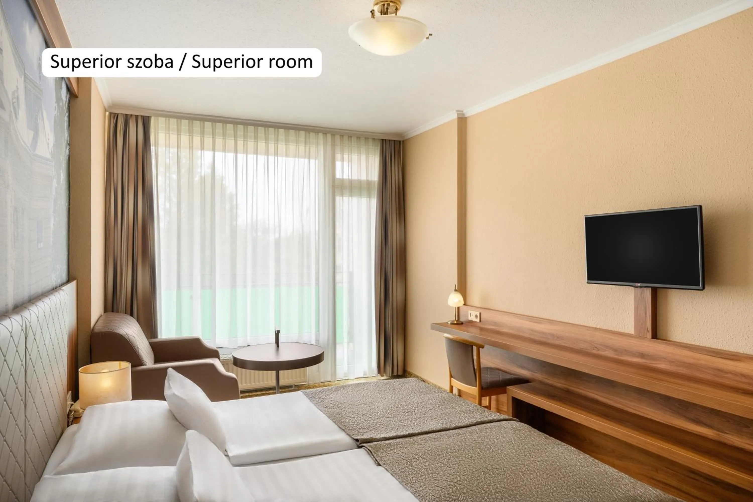 Bed in Aranyhomok Hotel Business & Relax