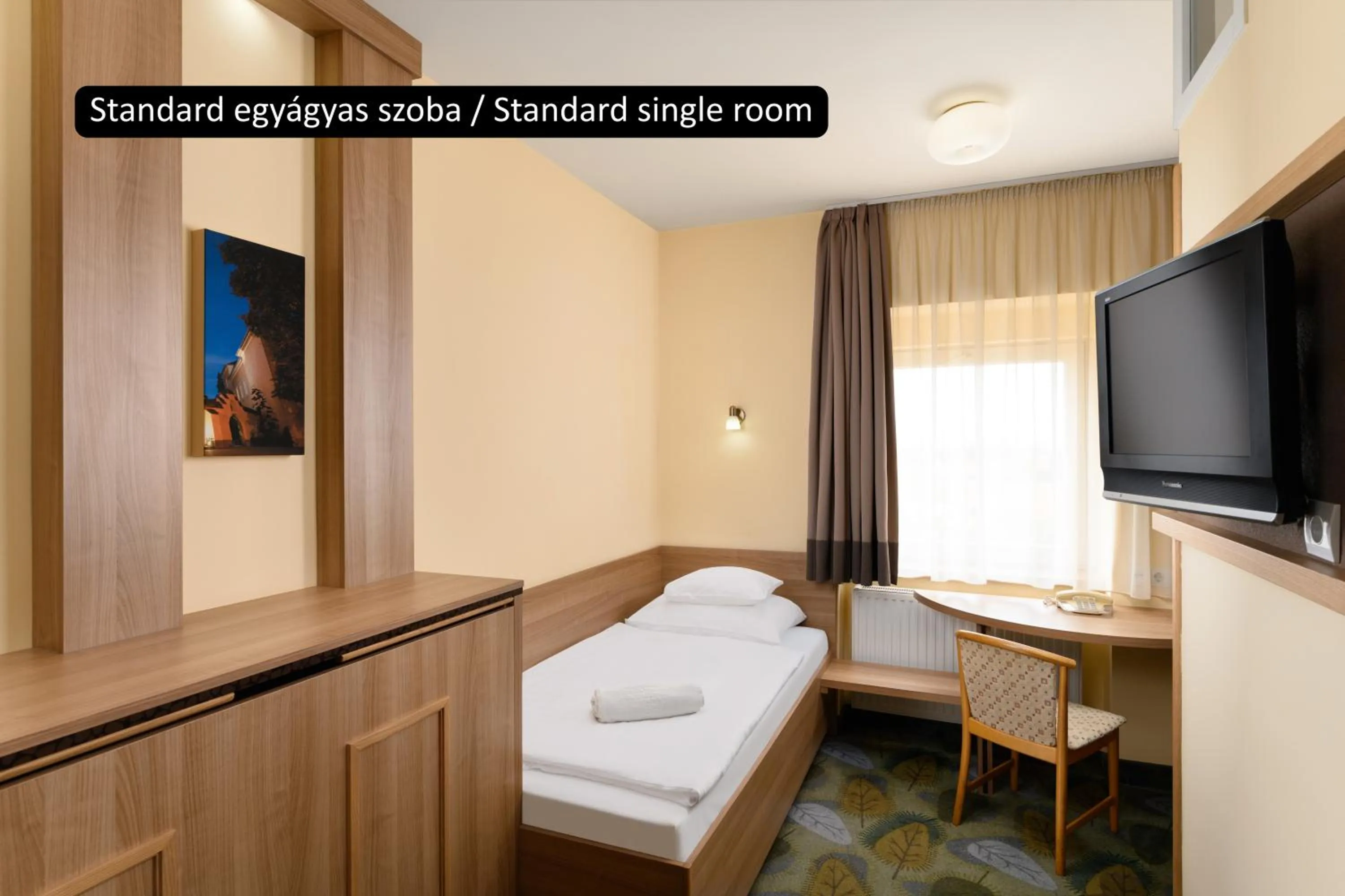 Bed in Aranyhomok Hotel Business & Relax