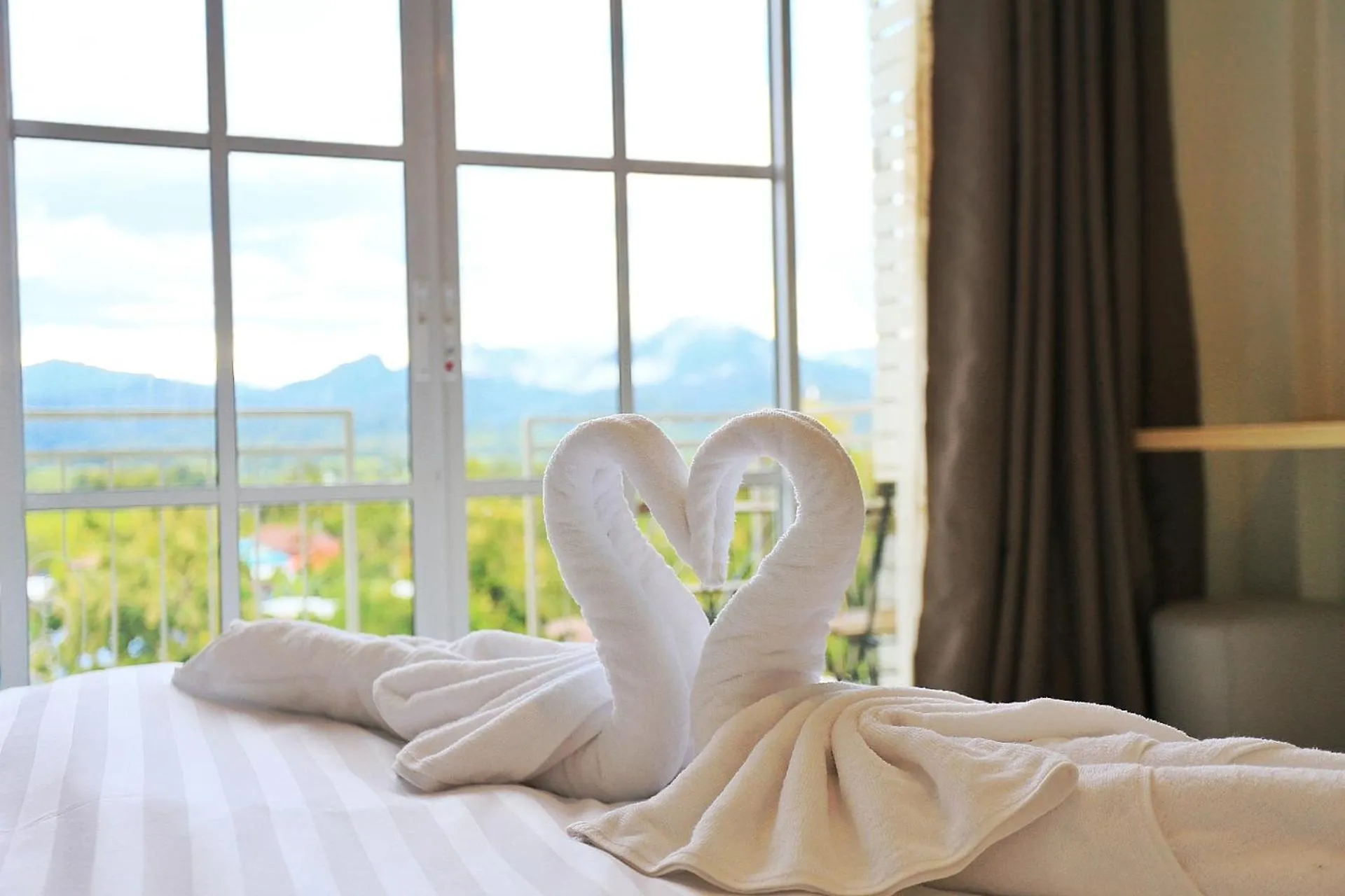 Bed in Pua De View Boutique Resort