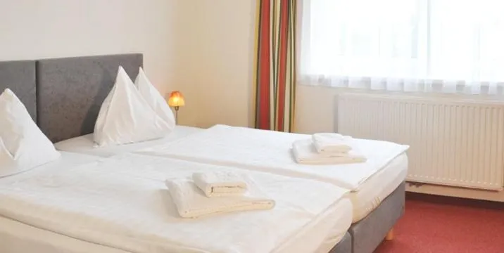 Bed in Hotel-Restaurant Moser Pöchlarn