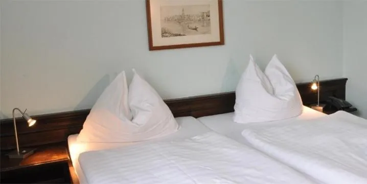 Bed in Hotel-Restaurant Moser Pöchlarn