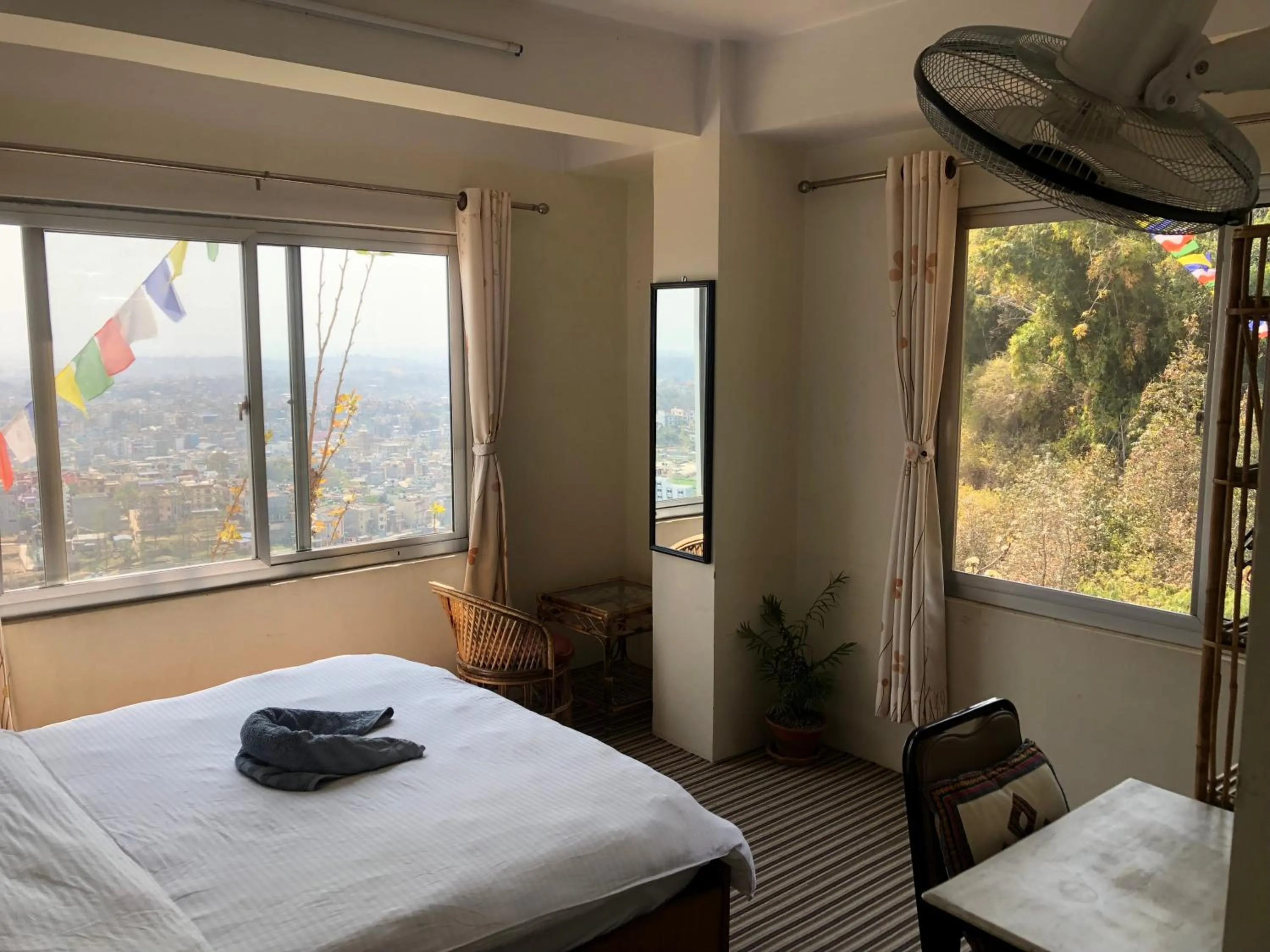 City view, Bed in Green Mandala Inn