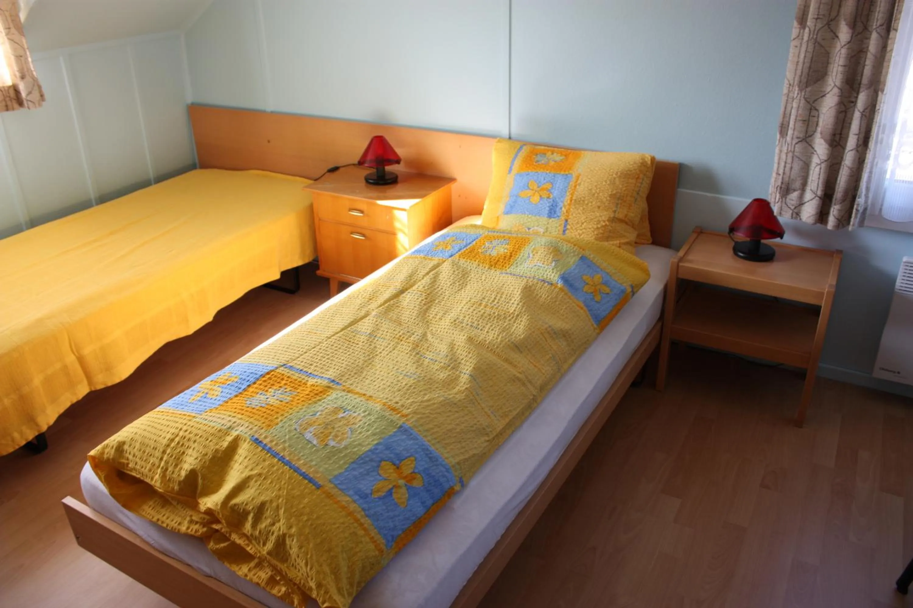 Bed in Hotel Koi-Gartenteich