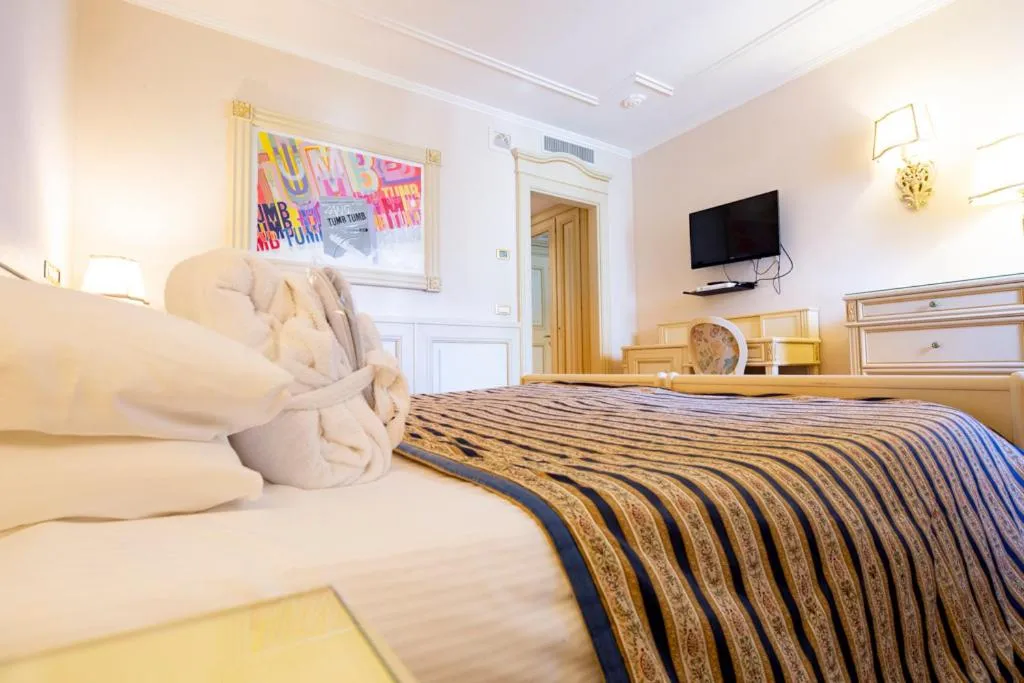 Bed in Hotel De Paris Sanremo