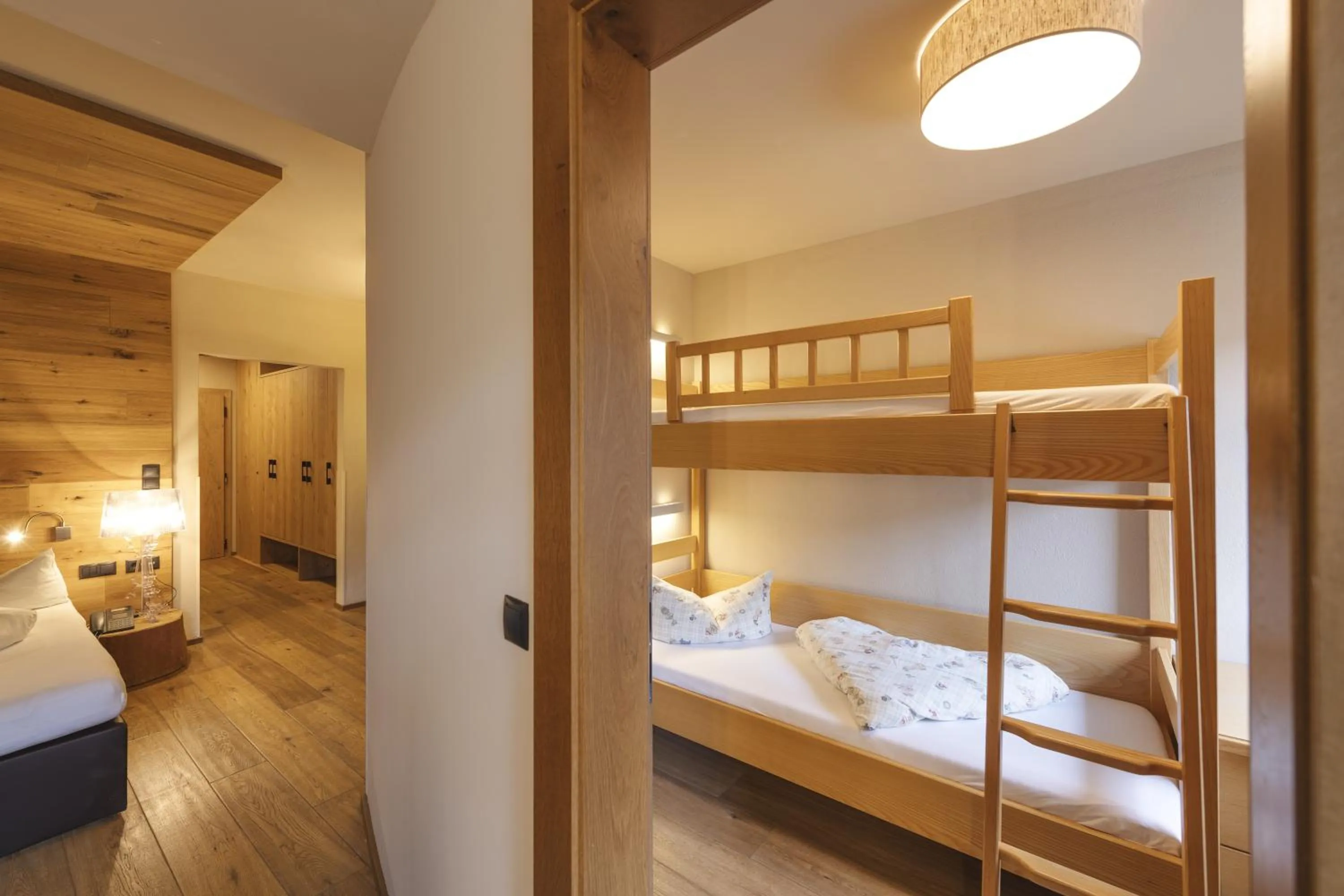 Living room, Bed in Almhof Family und Wellness Resort