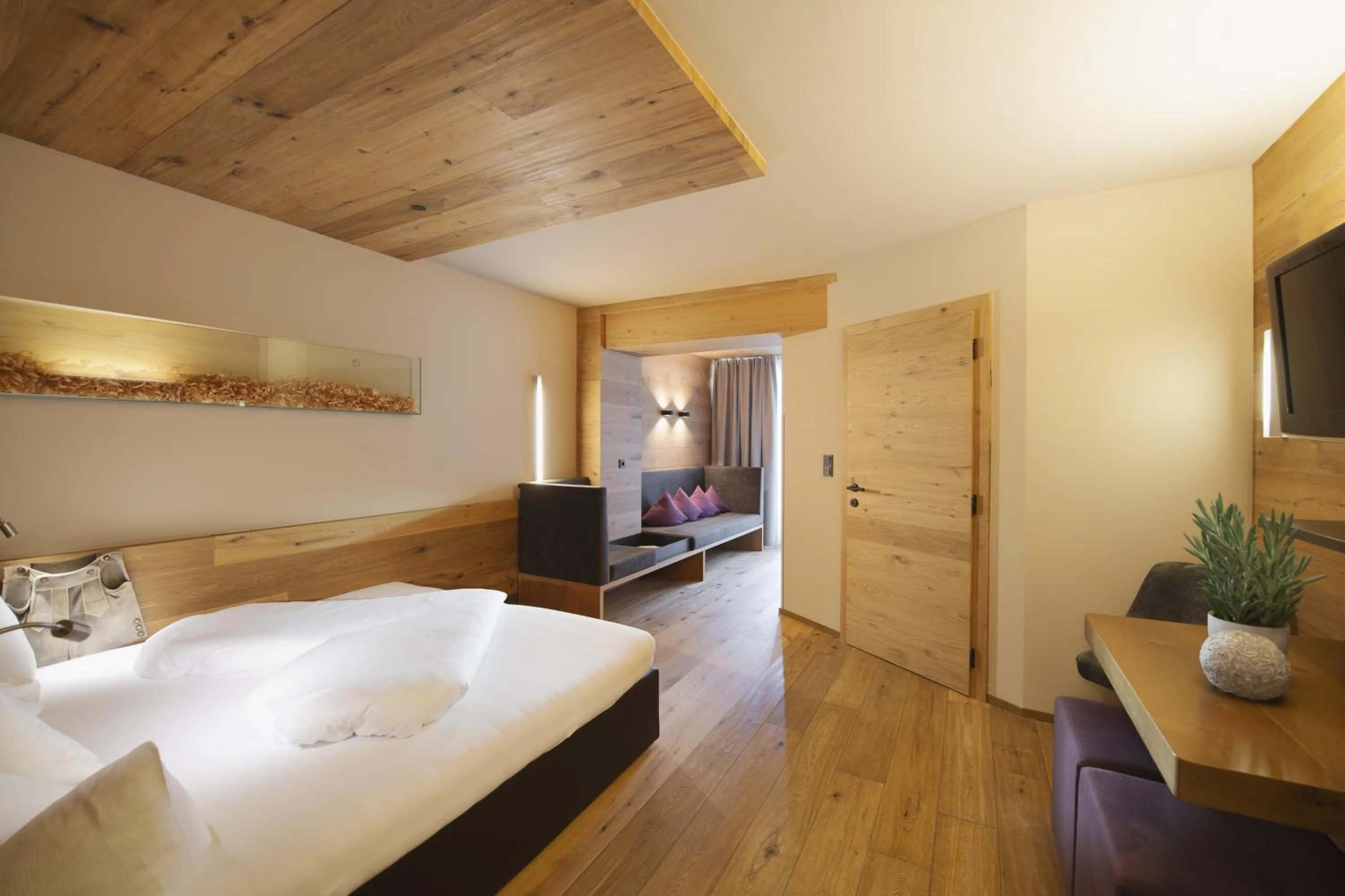 Living room, Bed in Almhof Family und Wellness Resort