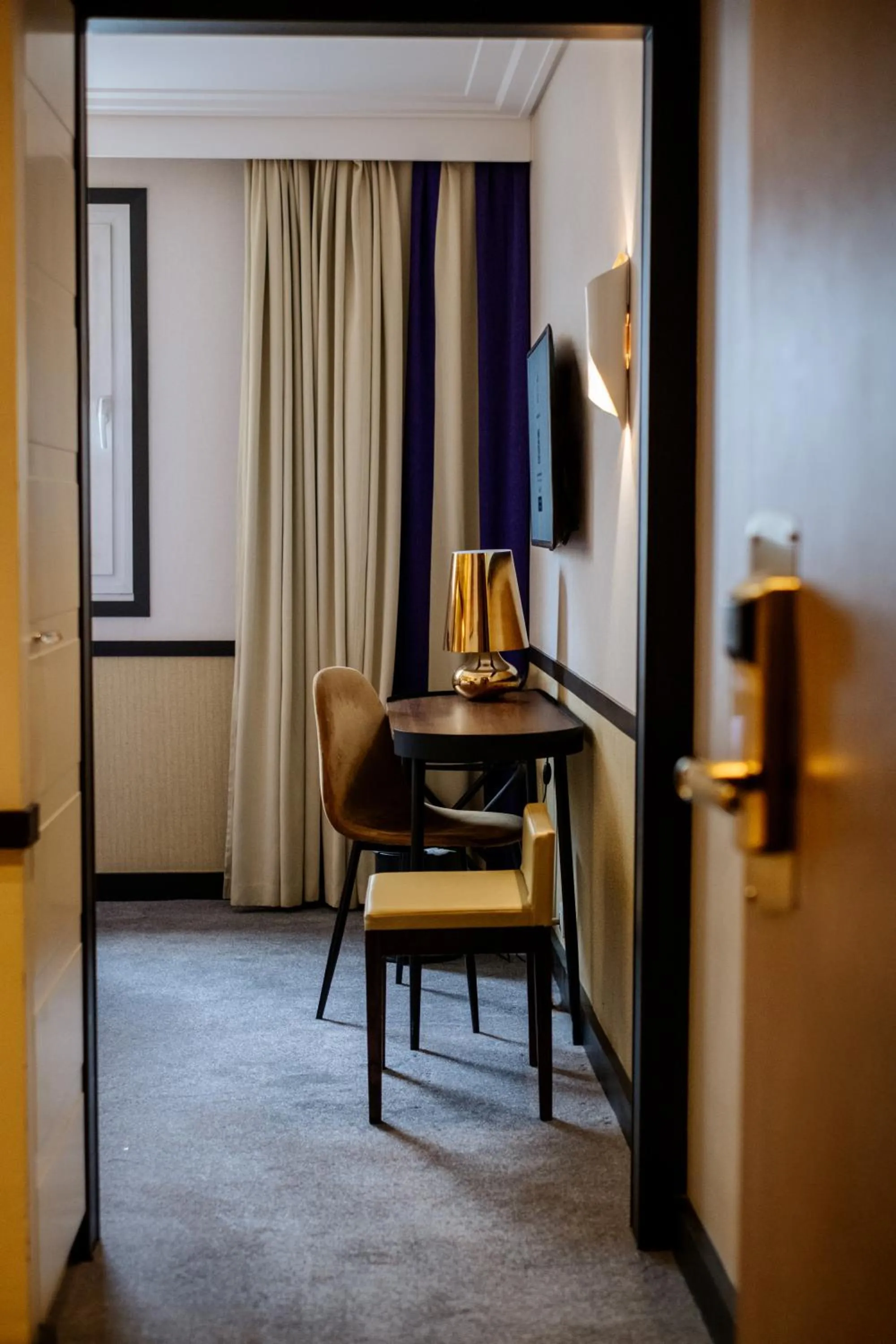 Bedroom in Hôtel Paris Neuilly