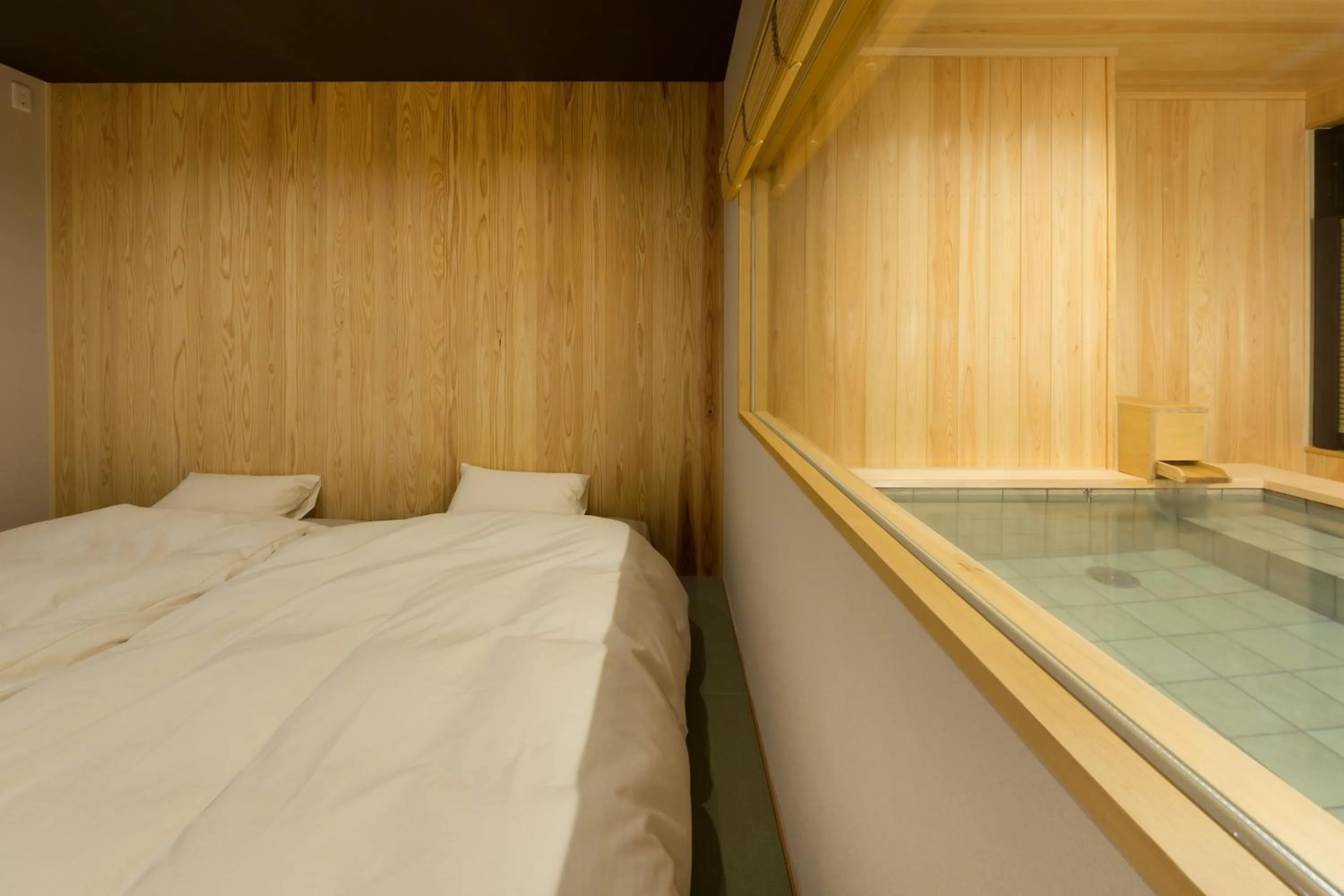 Bed in Hokuriku Yamashiro Onsen Hotel Kikyou