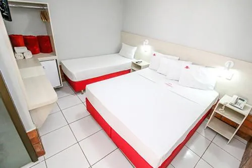 Bed in Hotel Pousada Bonsai