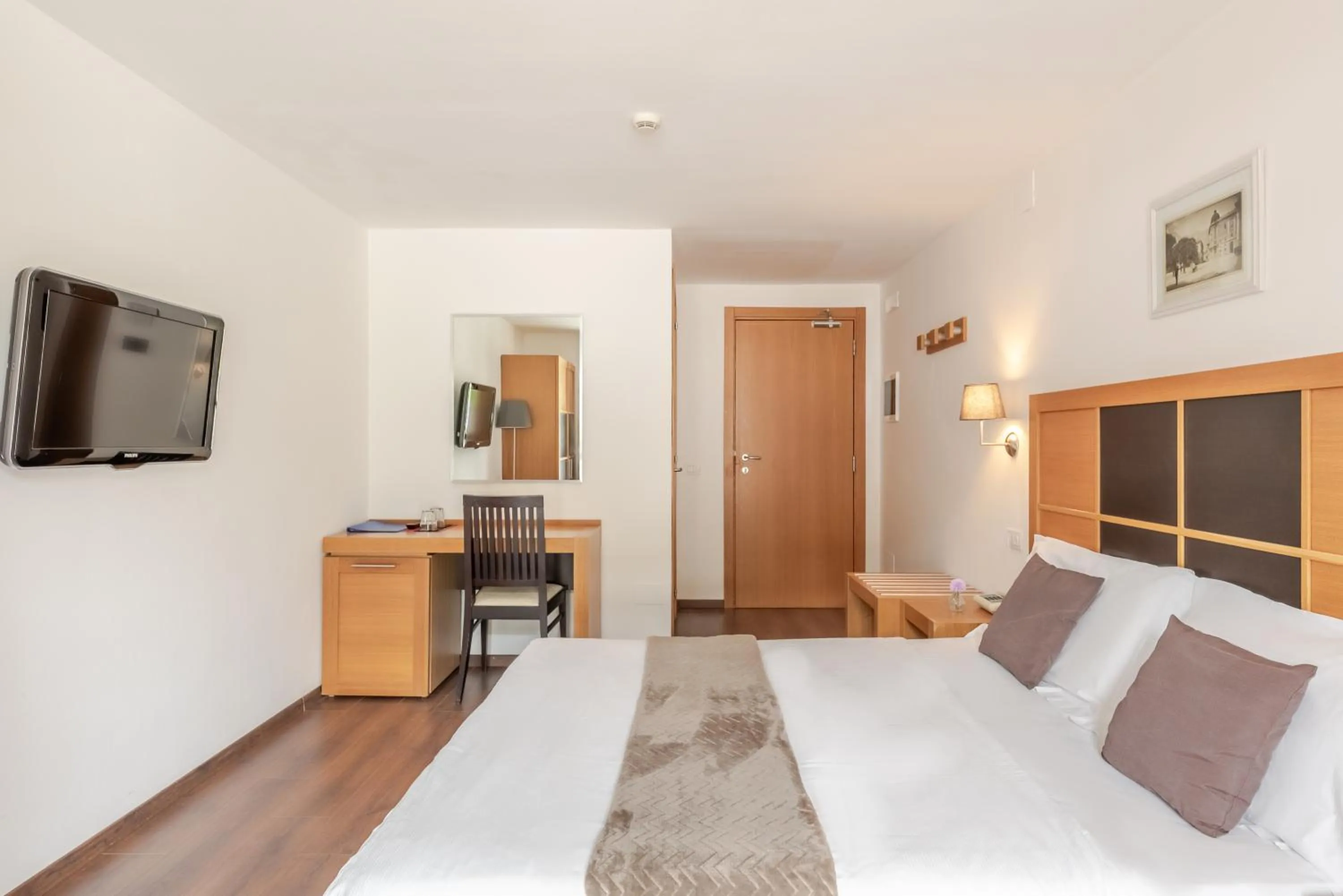 Bed in Hotel Dolomiti Chalet