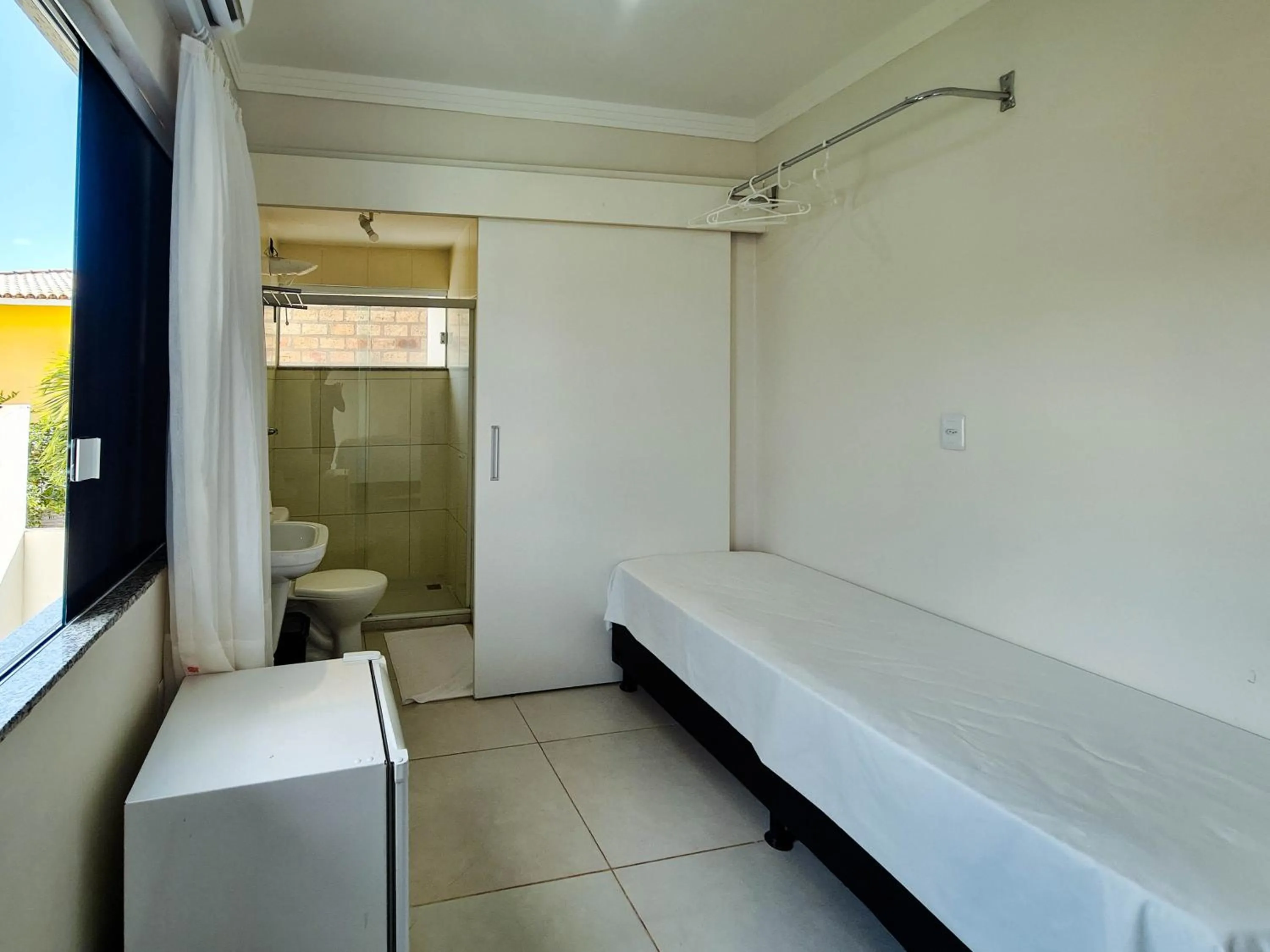 Bed in Pousada Praia do Flamengo