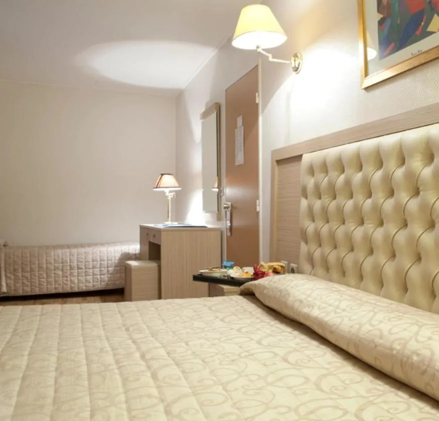 Bed in Hôtel Lebron