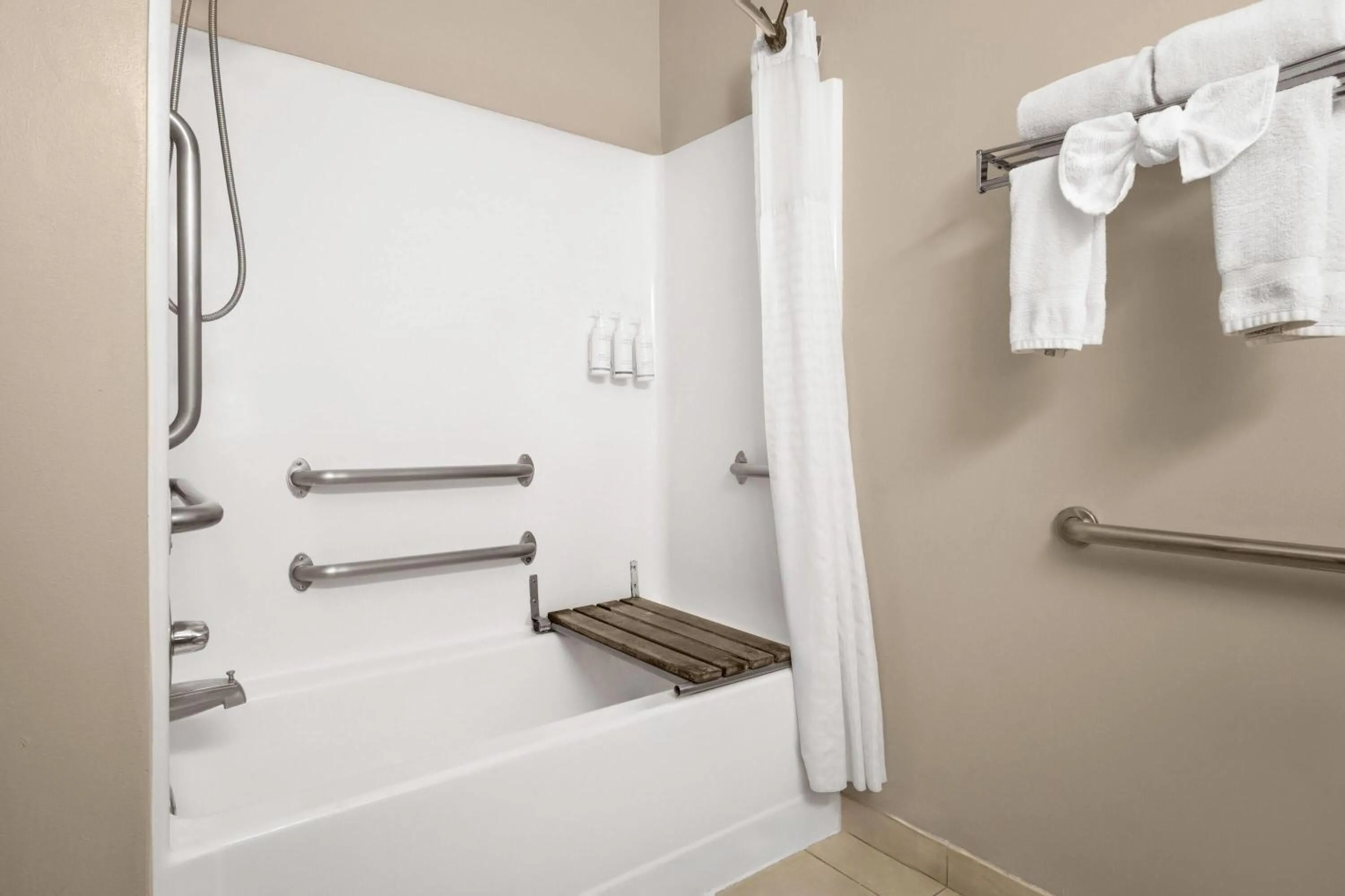 Bathroom in Days Inn & Suites by Wyndham Airport Albuquerque