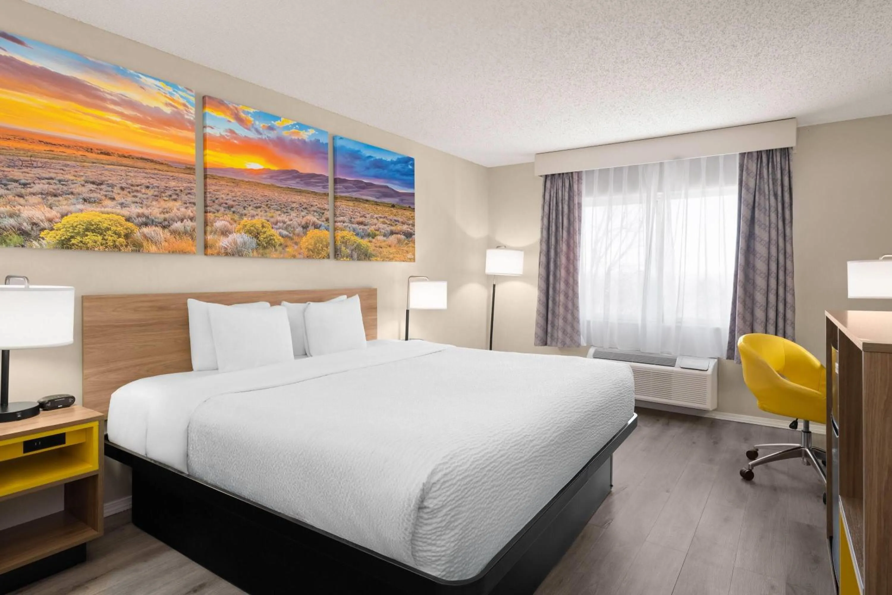 Photo of the whole room, Bed in Days Inn & Suites by Wyndham Airport Albuquerque