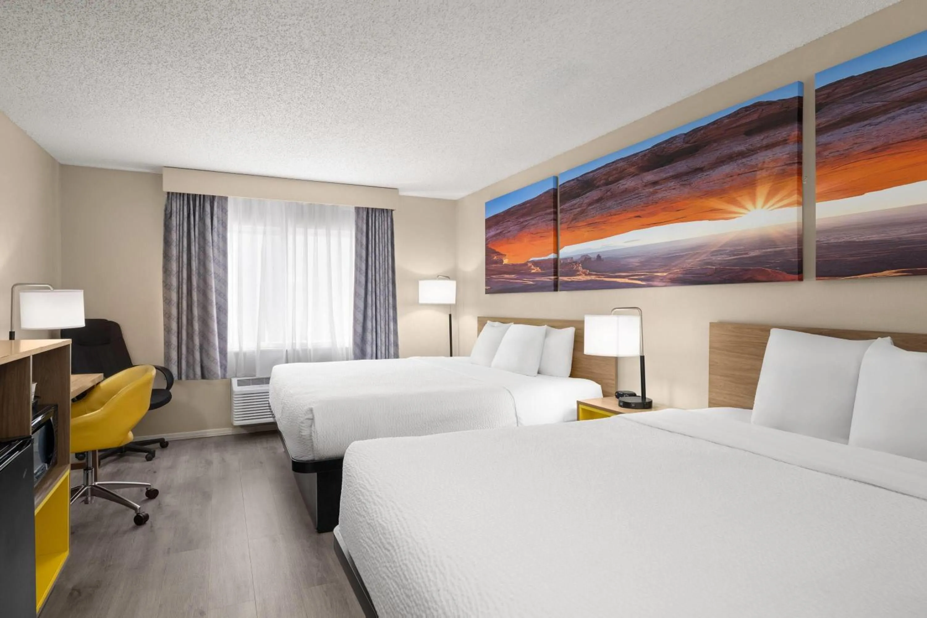 Photo of the whole room, Bed in Days Inn & Suites by Wyndham Airport Albuquerque