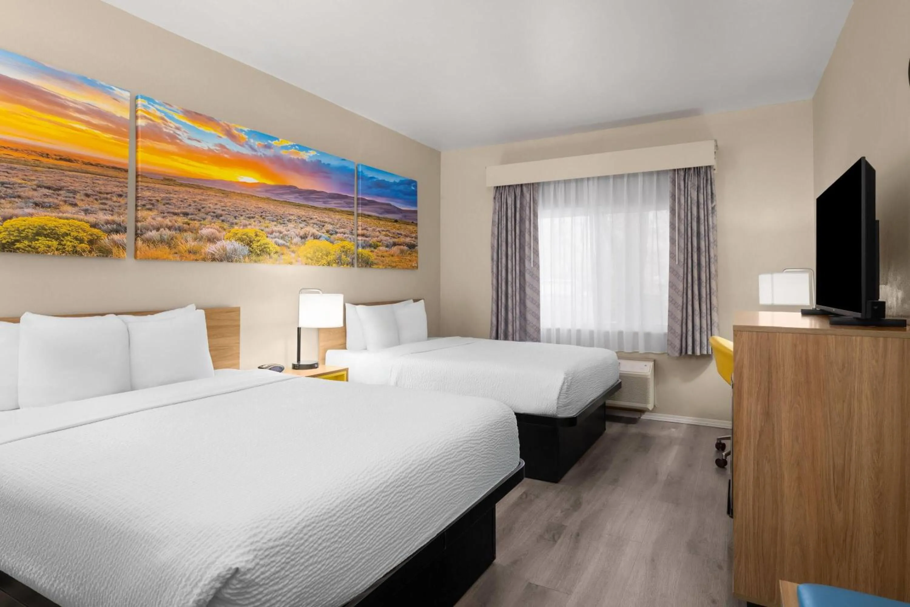 Photo of the whole room, Bed in Days Inn & Suites by Wyndham Airport Albuquerque