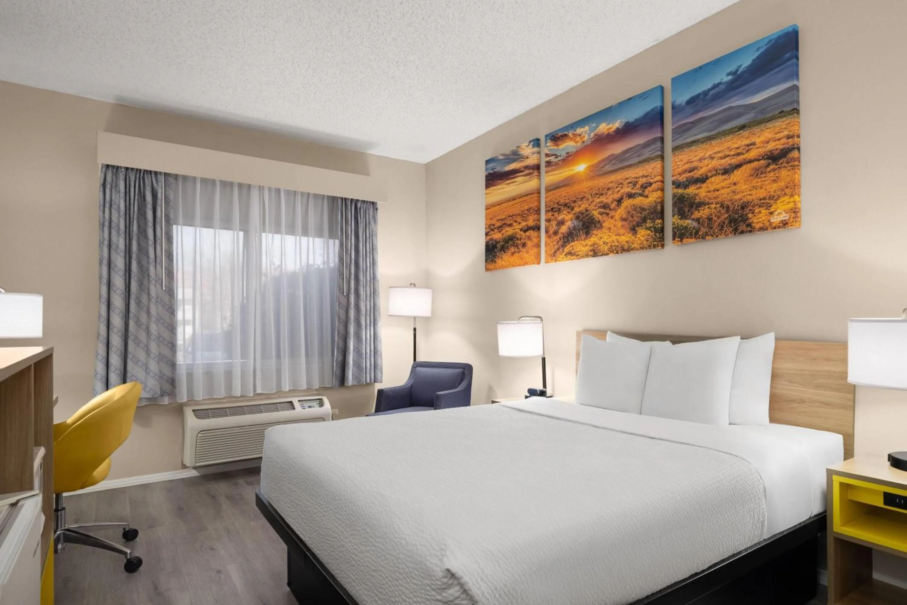 Photo of the whole room, Bed in Days Inn & Suites by Wyndham Airport Albuquerque