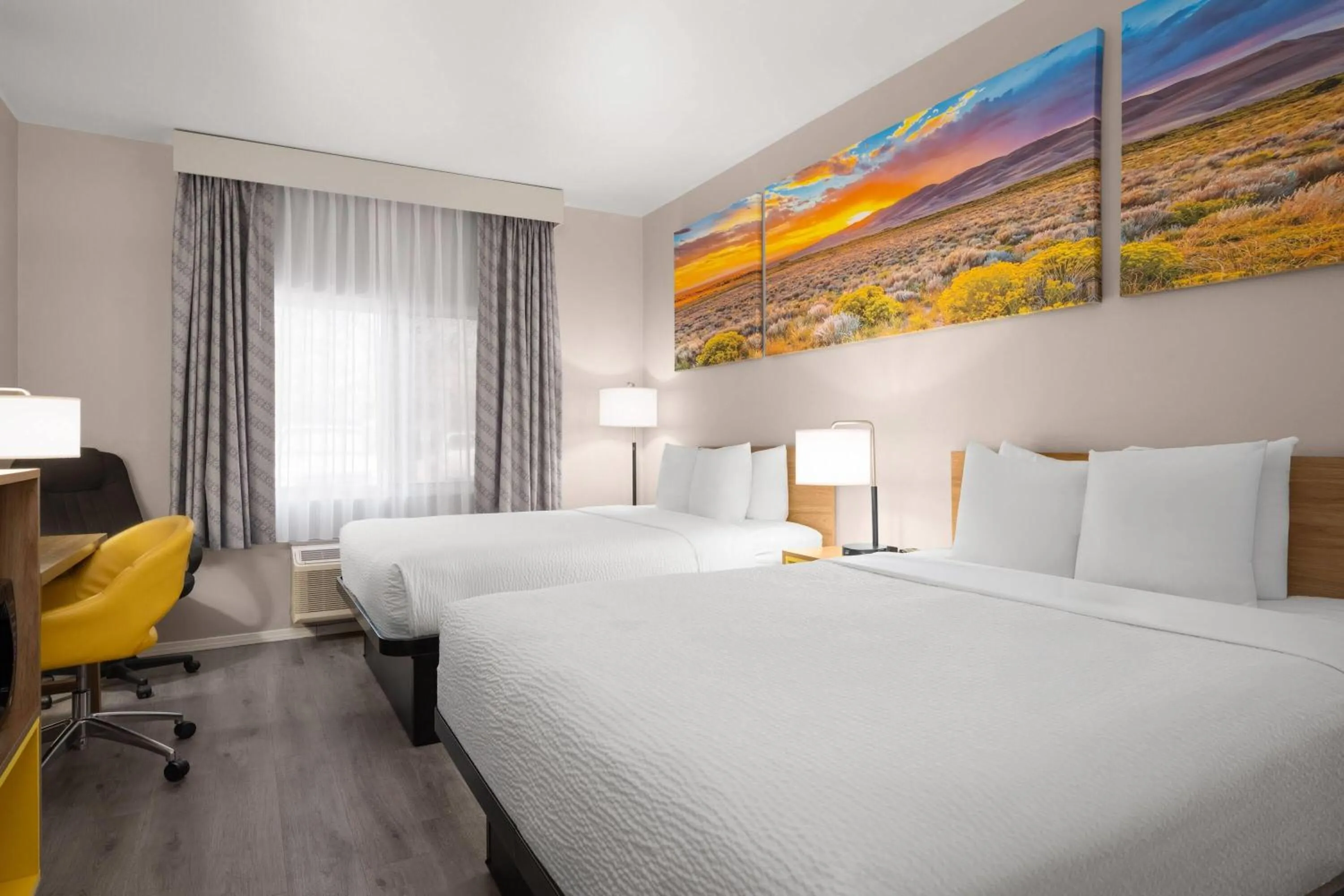 Photo of the whole room, Bed in Days Inn & Suites by Wyndham Airport Albuquerque