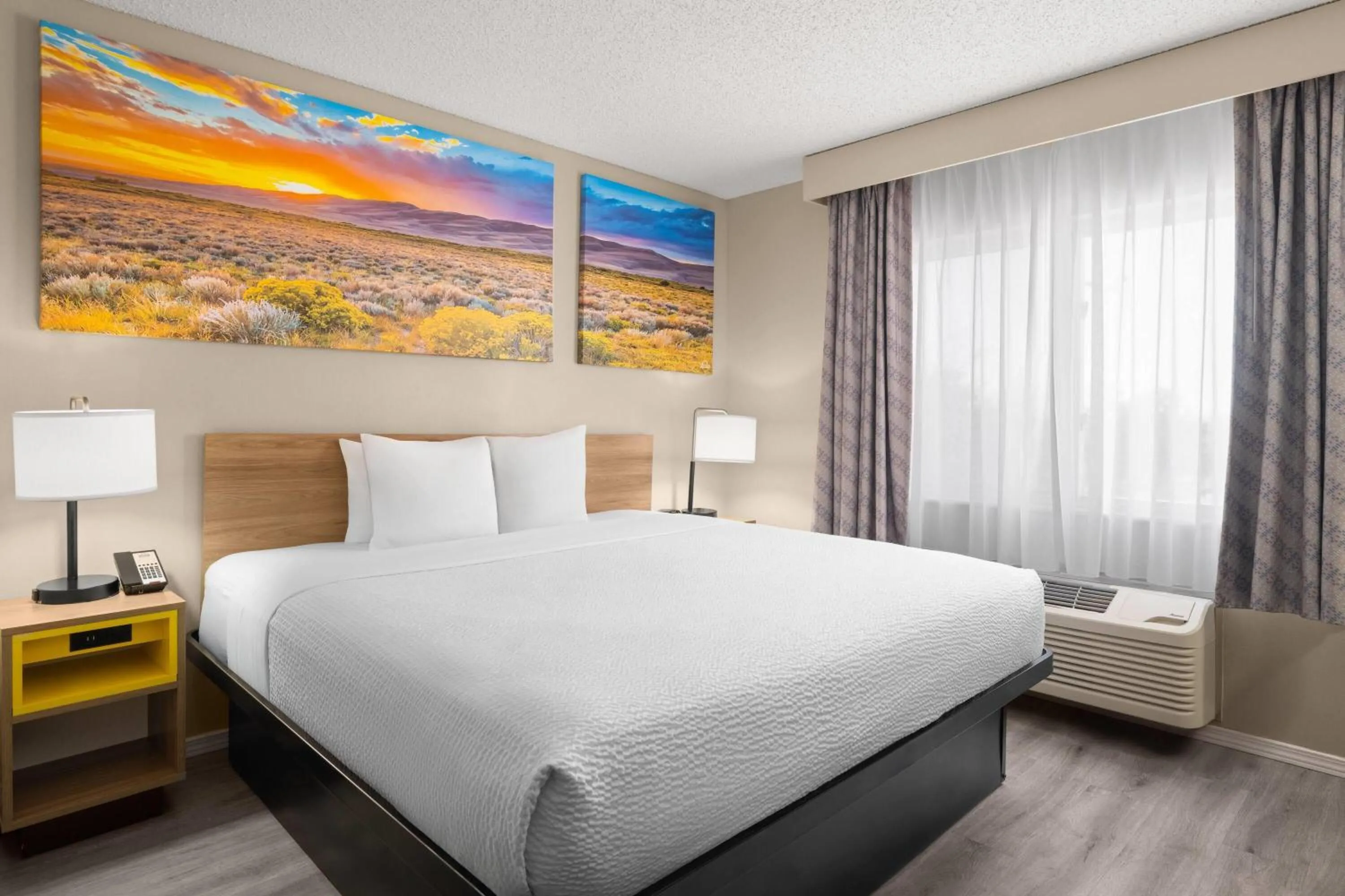 Photo of the whole room, Bed in Days Inn & Suites by Wyndham Airport Albuquerque
