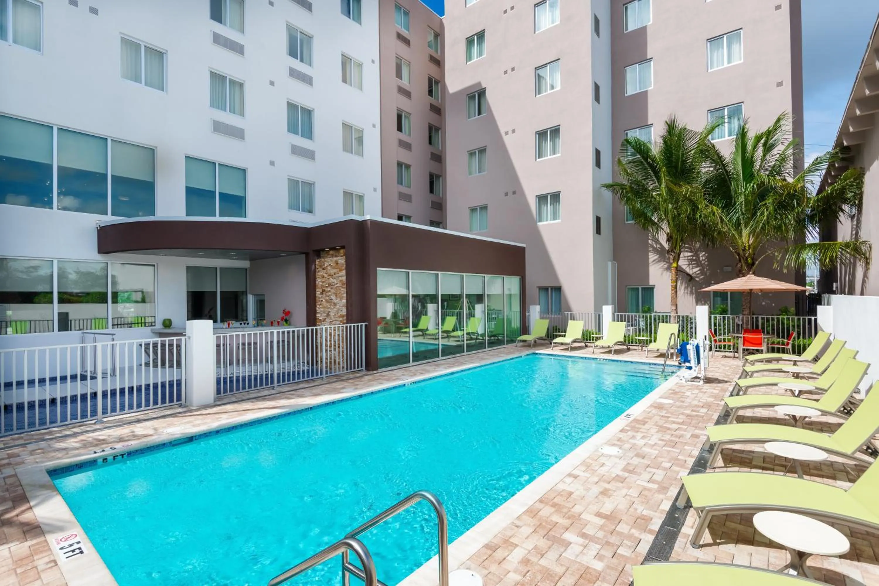 Swimming pool in Staybridge Suites - Miami International Airport by IHG