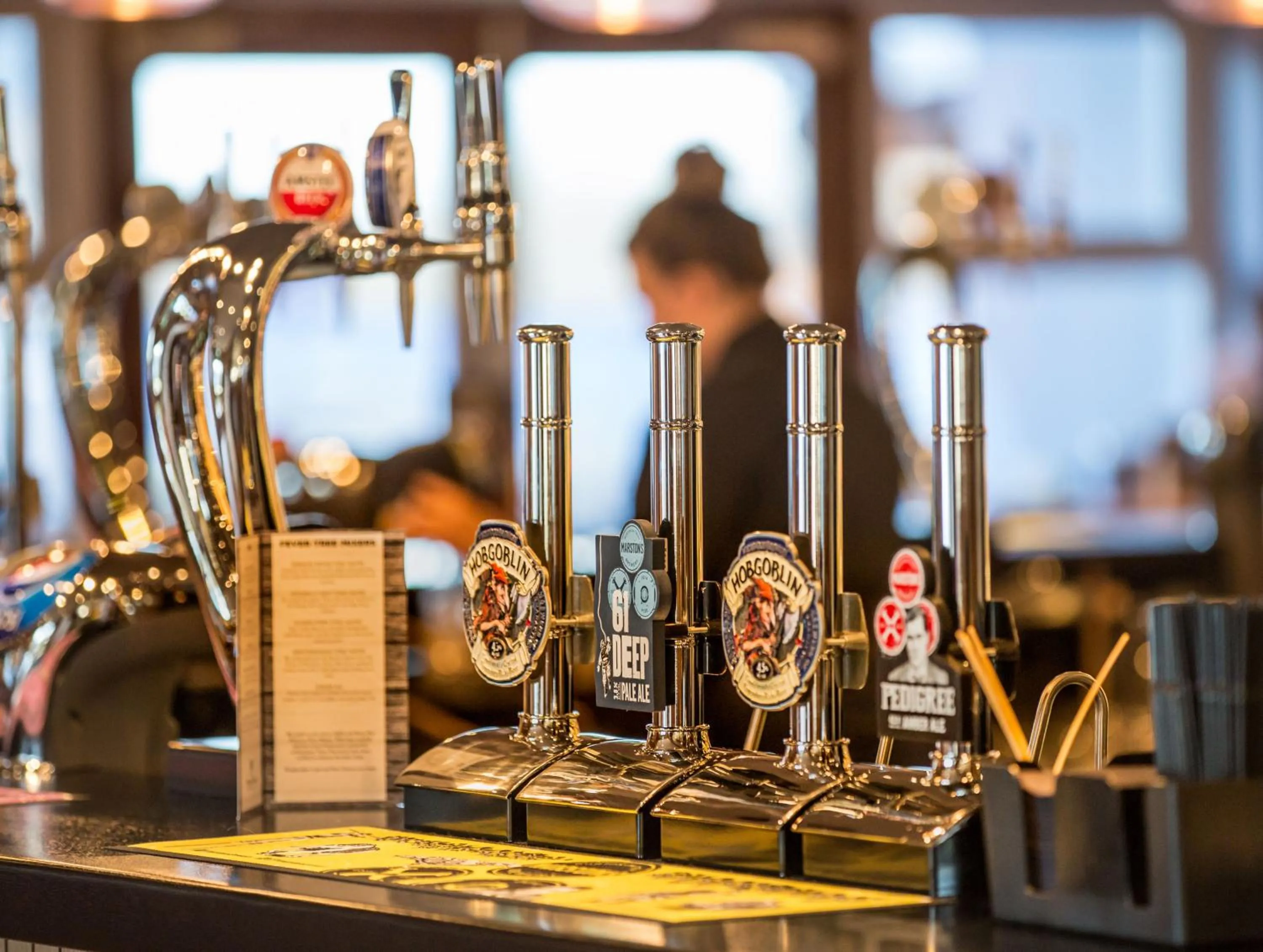 Lounge or bar in The Raven’s Cliff Lodge by Marston's Inns