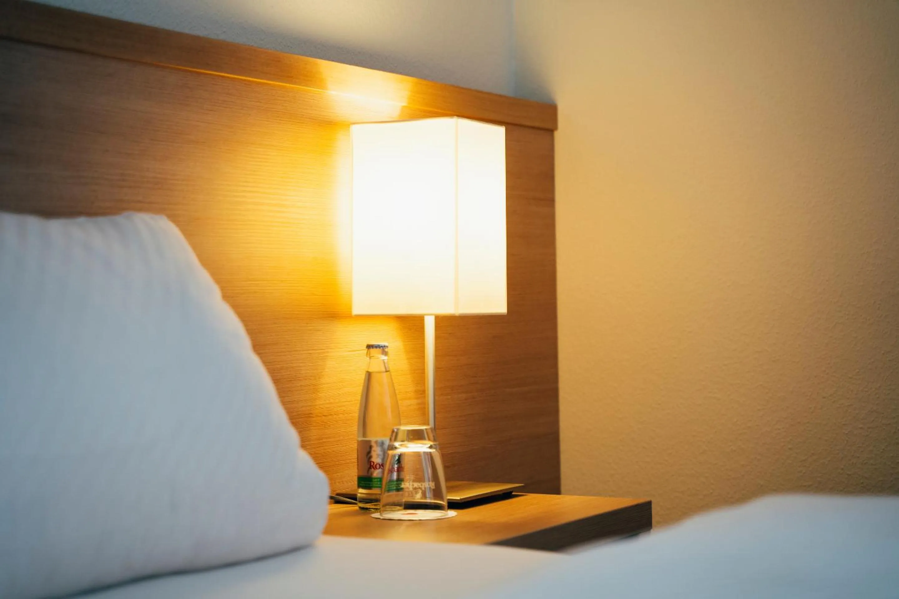 Photo of the whole room, Bed in business & conference Sporthotel Großwallstadt