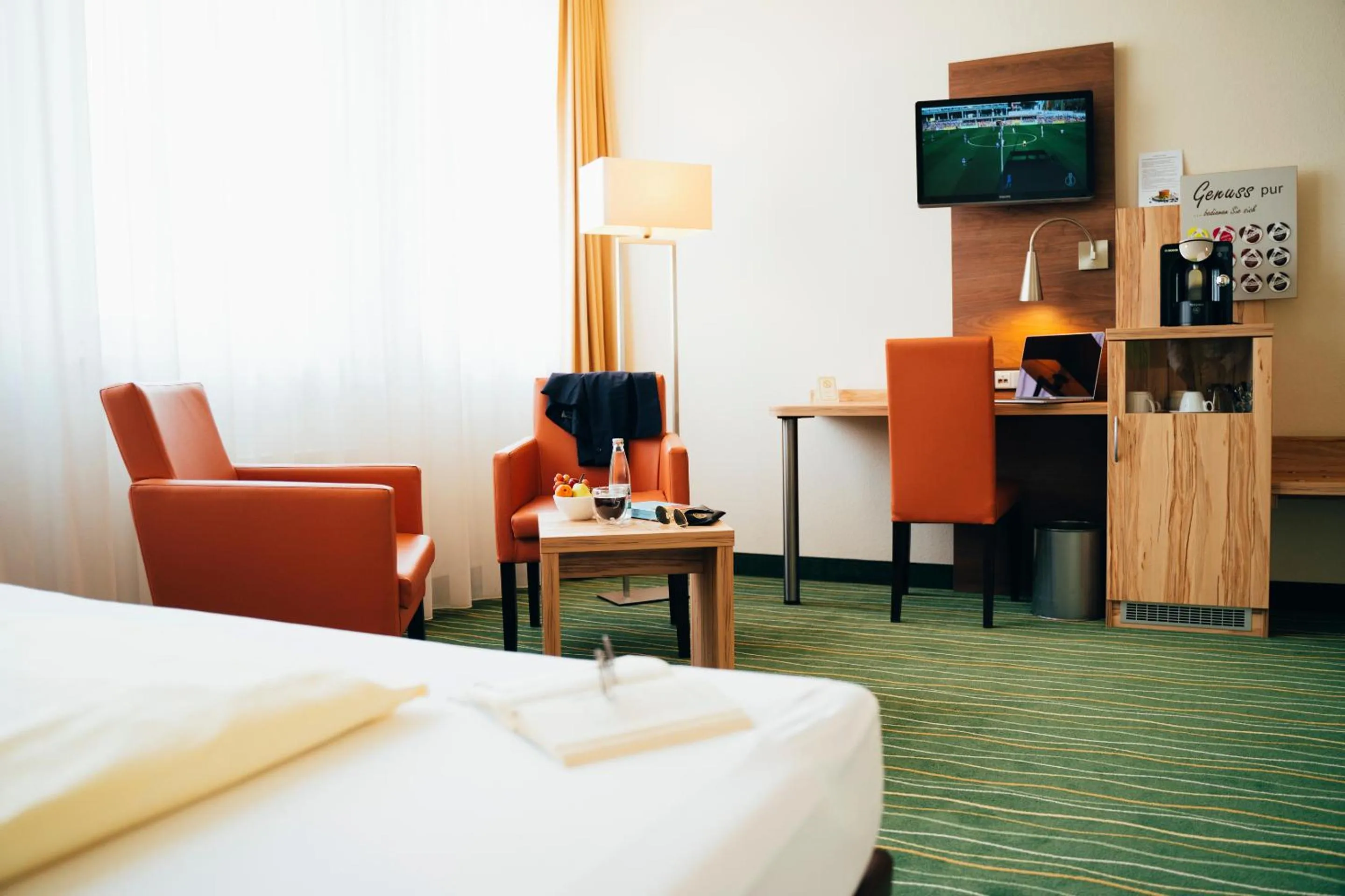 Photo of the whole room, Bed in business & conference Sporthotel Großwallstadt