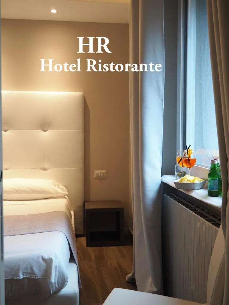 Bed in Hotel Riposo