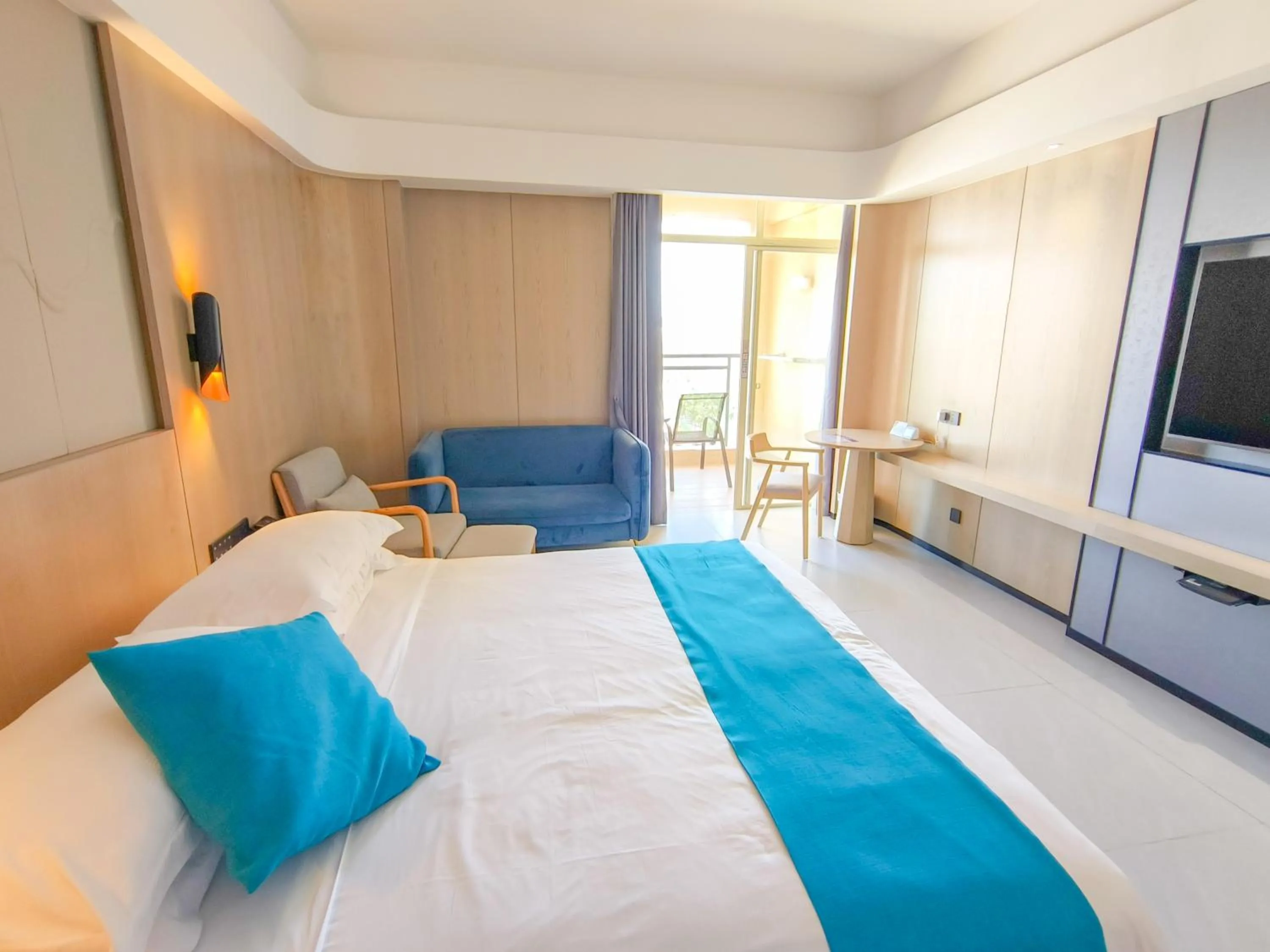 Bed in Shengyi Holiday Villa Hotel