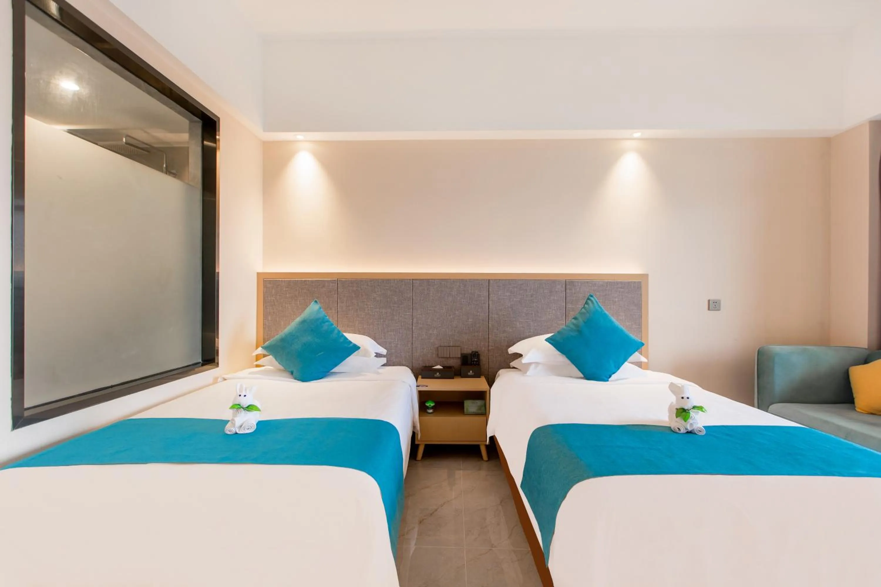 Bed in Shengyi Holiday Villa Hotel