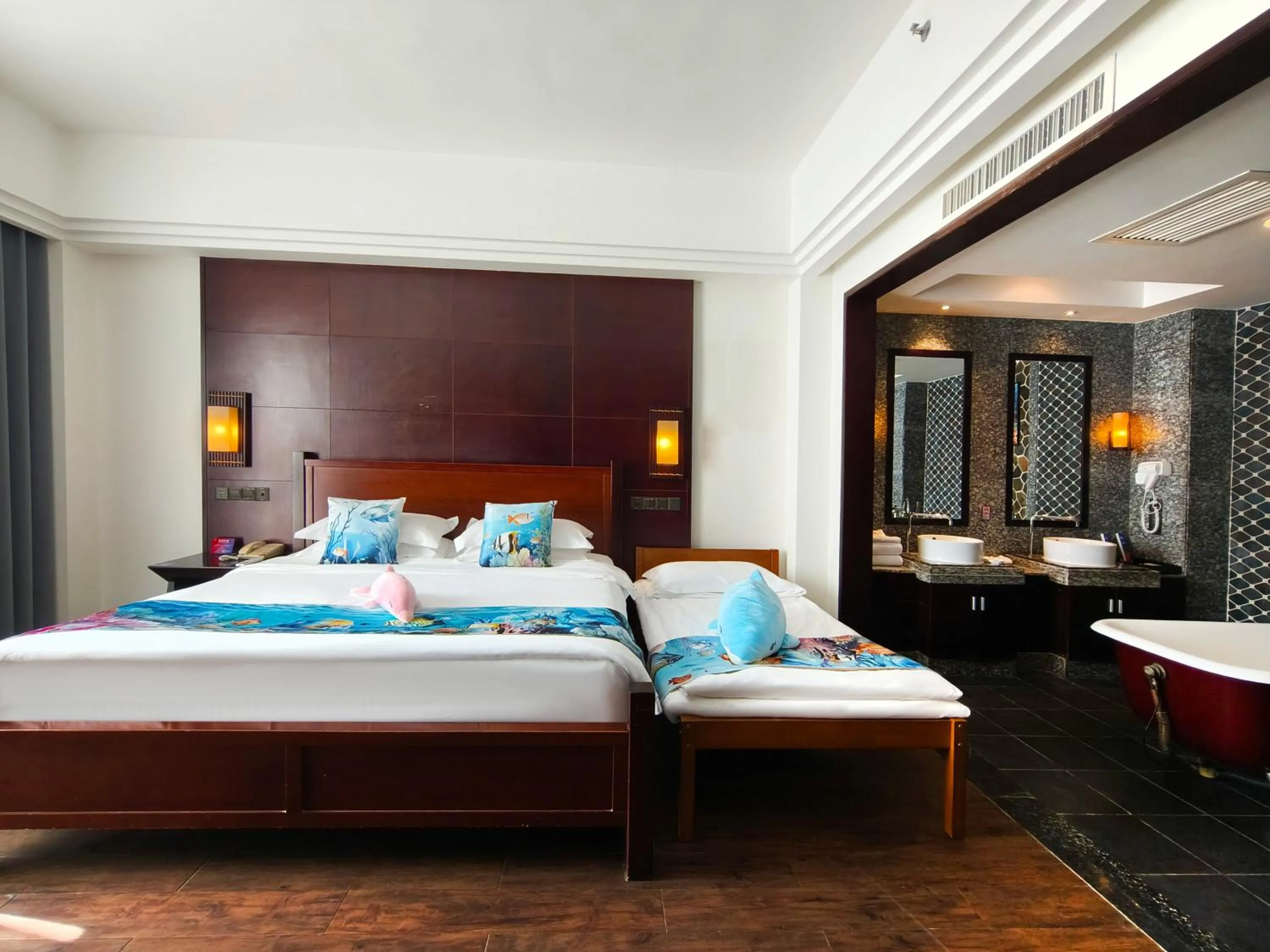 Bed in Shengyi Holiday Villa Hotel