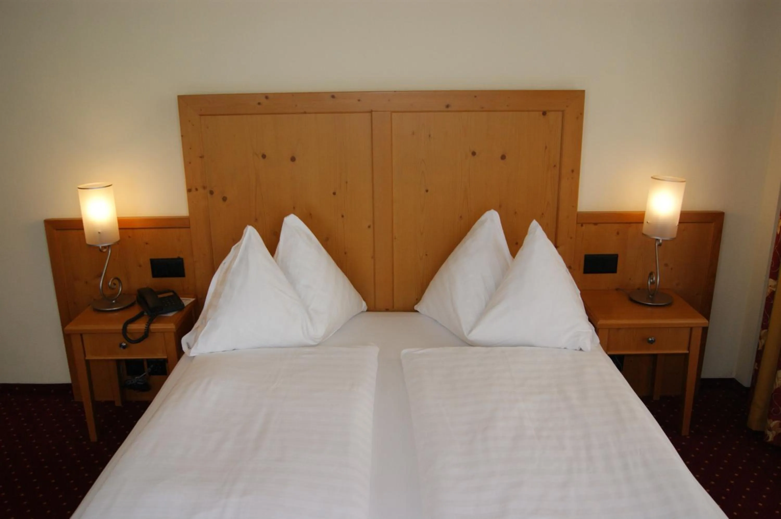 Photo of the whole room, Bed in Hotel Schweizerhof