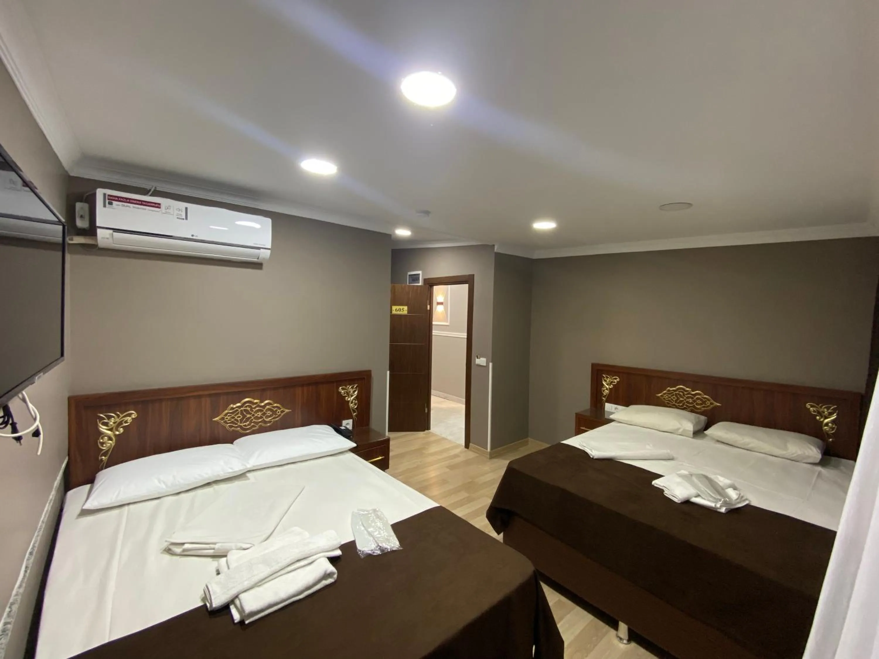 Bed in Grand Oral Hotel