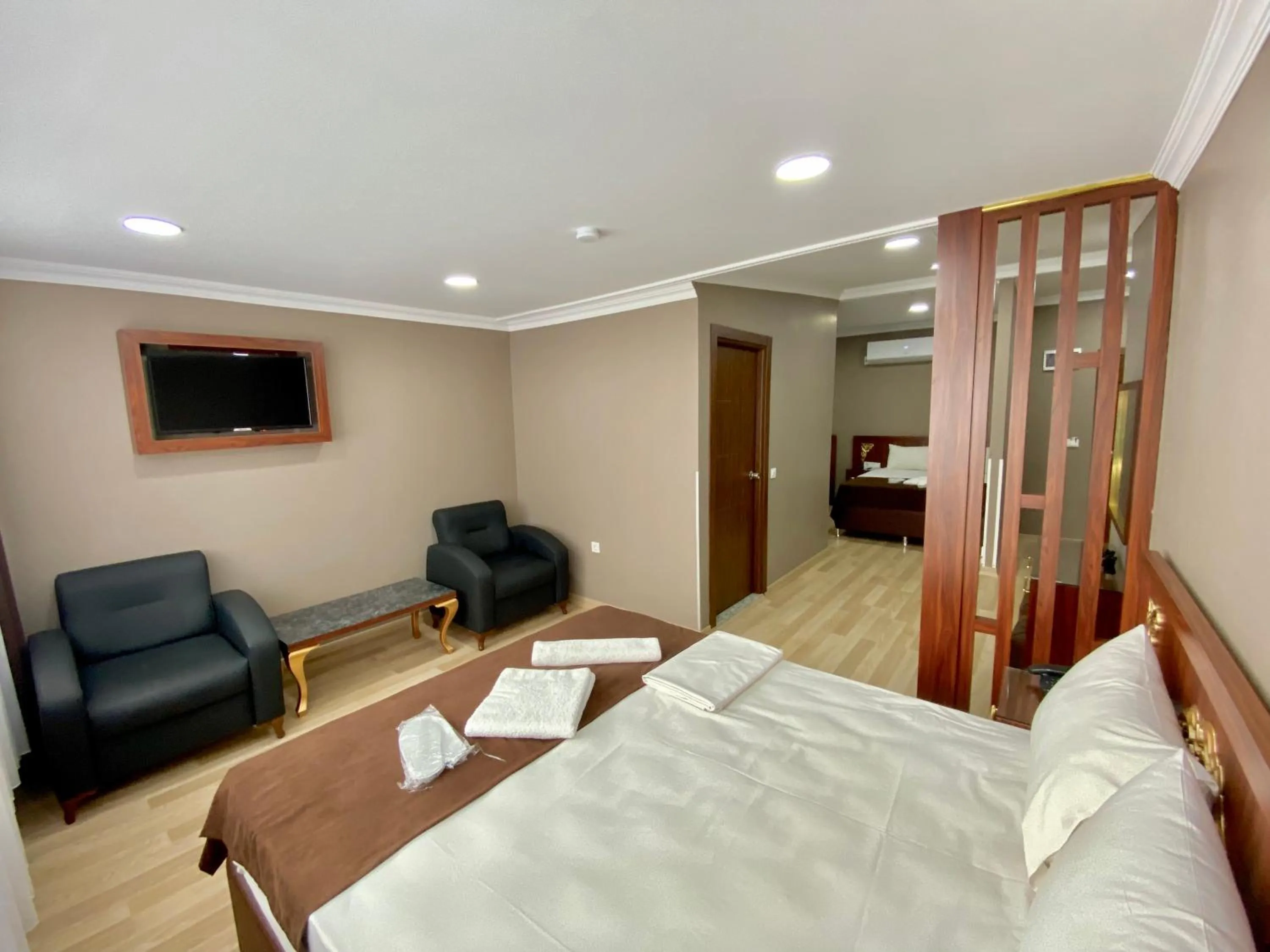 Bed in Grand Oral Hotel