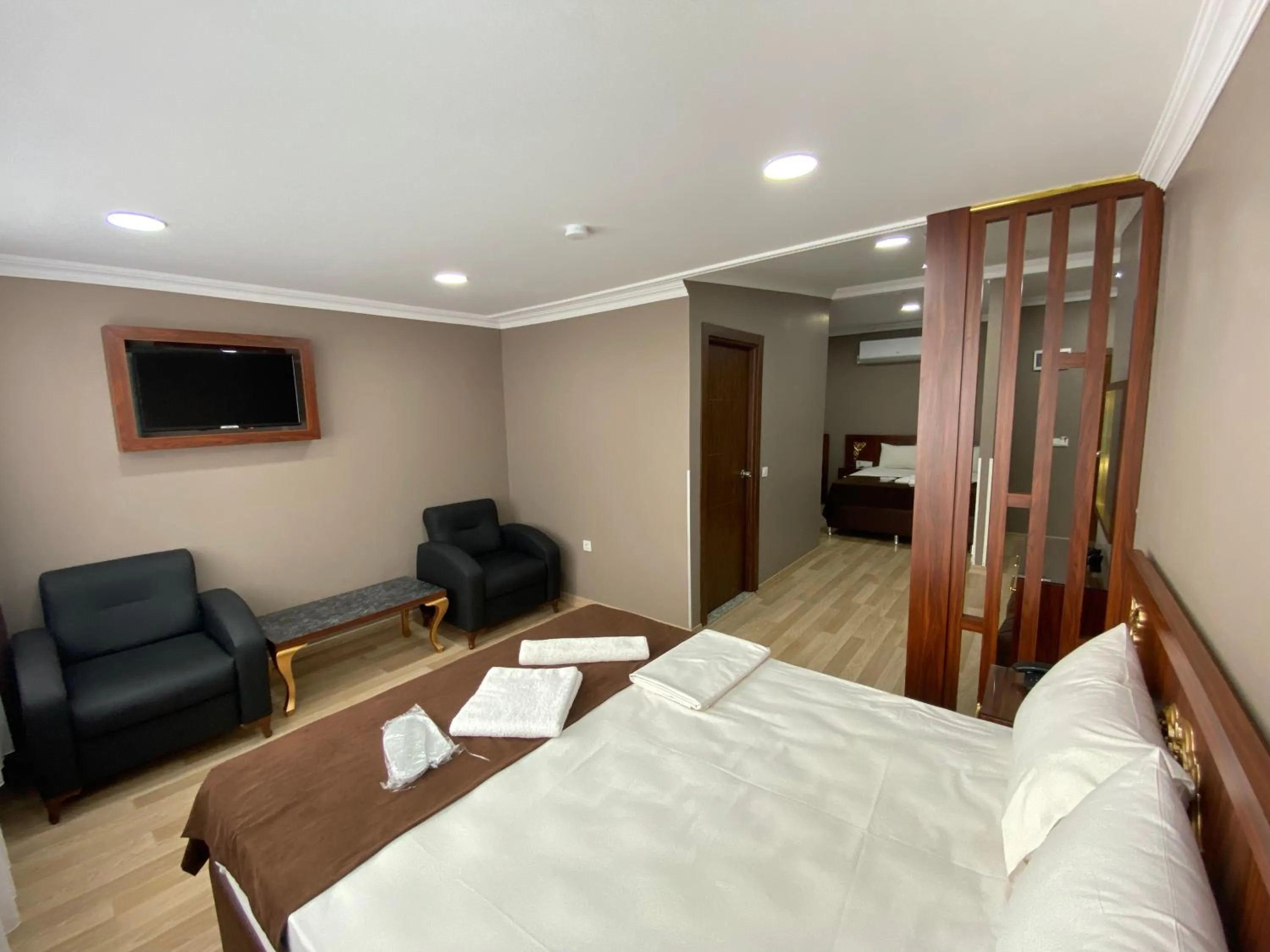 Bed in Grand Oral Hotel