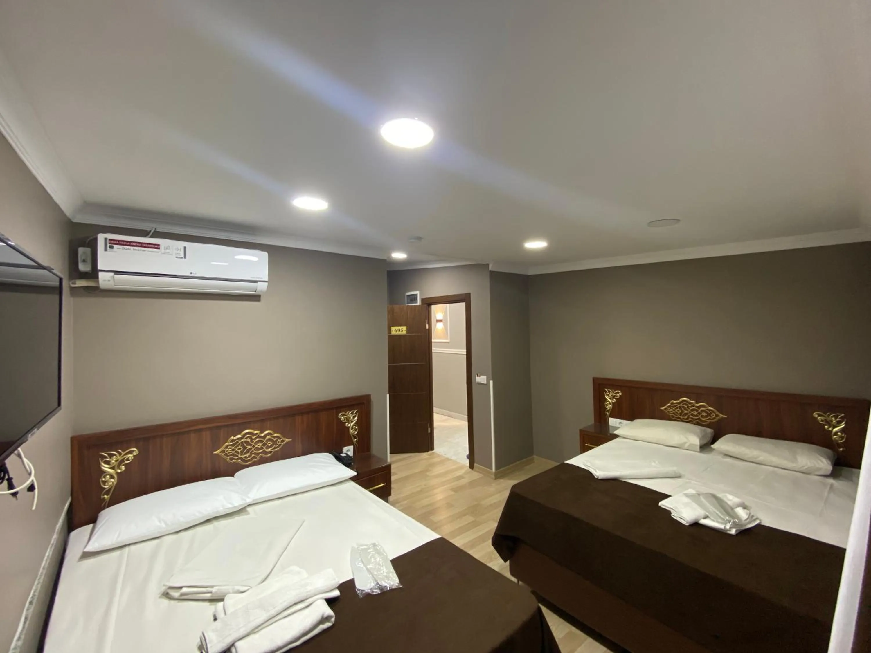 Bed in Grand Oral Hotel