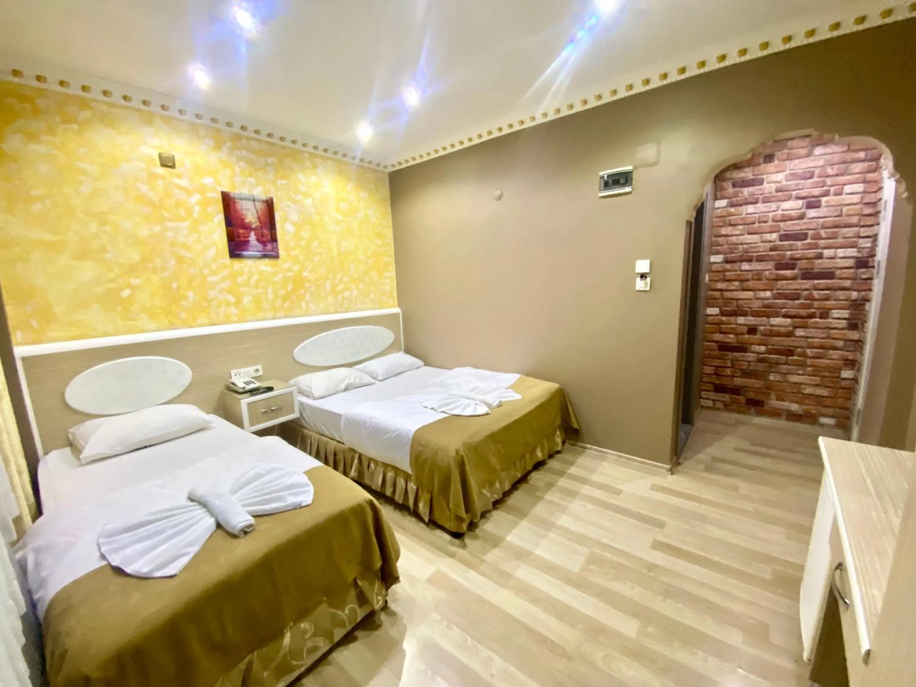 Bed in Grand Oral Hotel