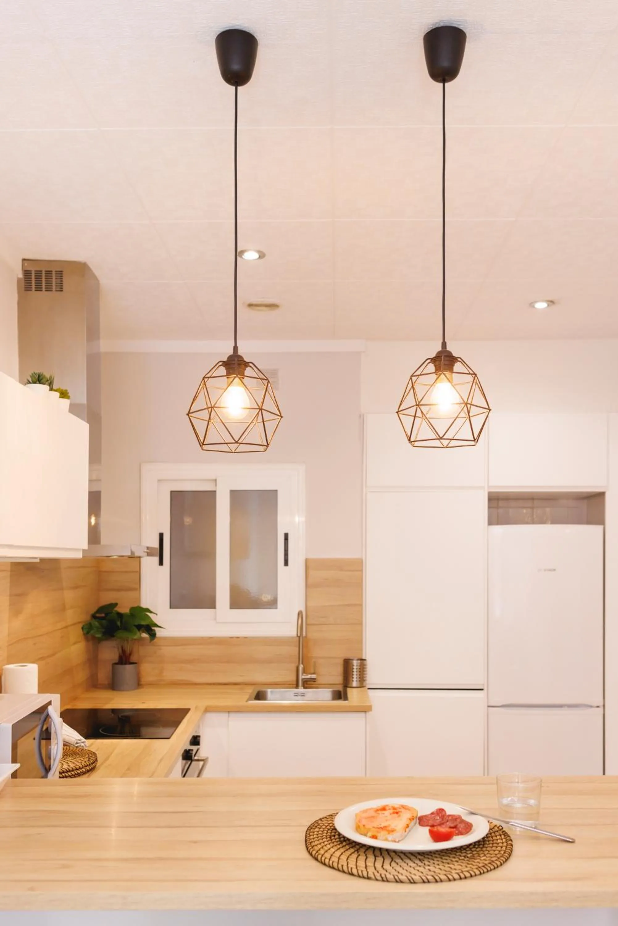 Kitchen or kitchenette in Bravissimo Apartaments Mora 4