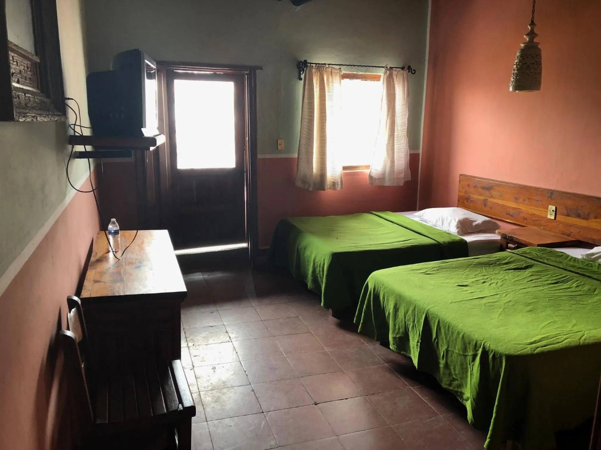 Bed in Posada de la Mision, Hotel Museo y Jardin
