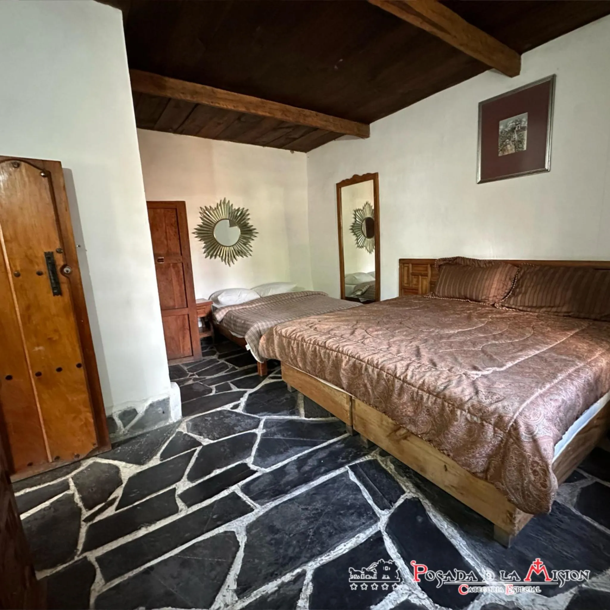 Bed in Posada de la Mision, Hotel Museo y Jardin