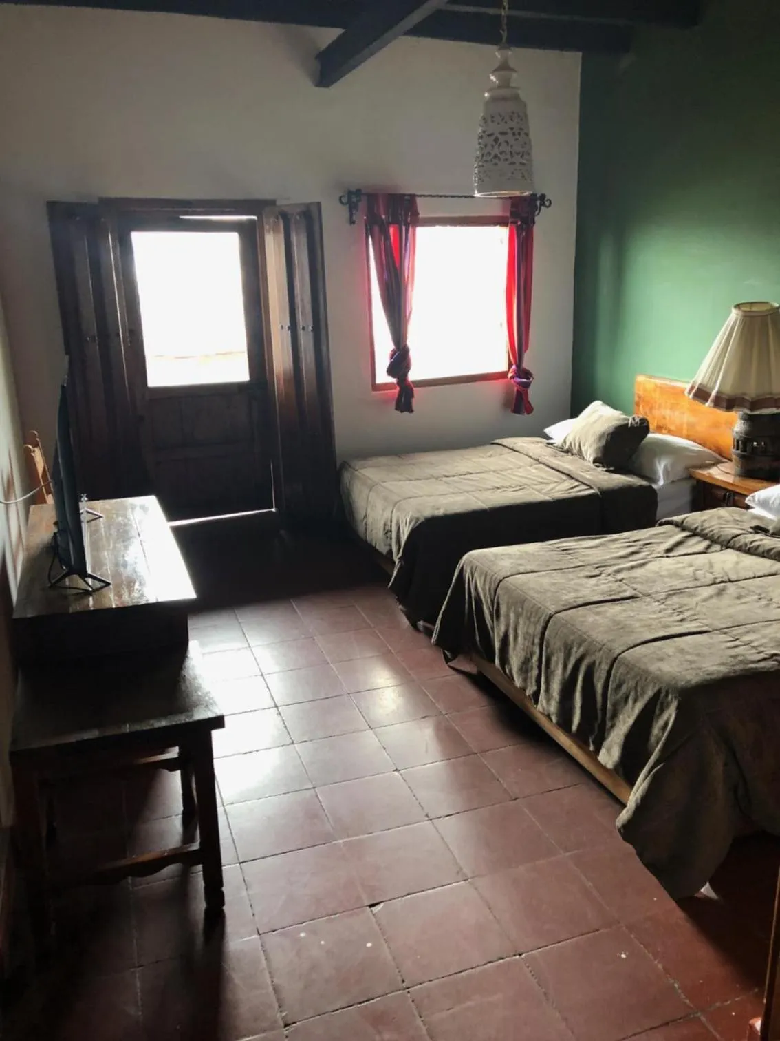 Bed in Posada de la Mision, Hotel Museo y Jardin