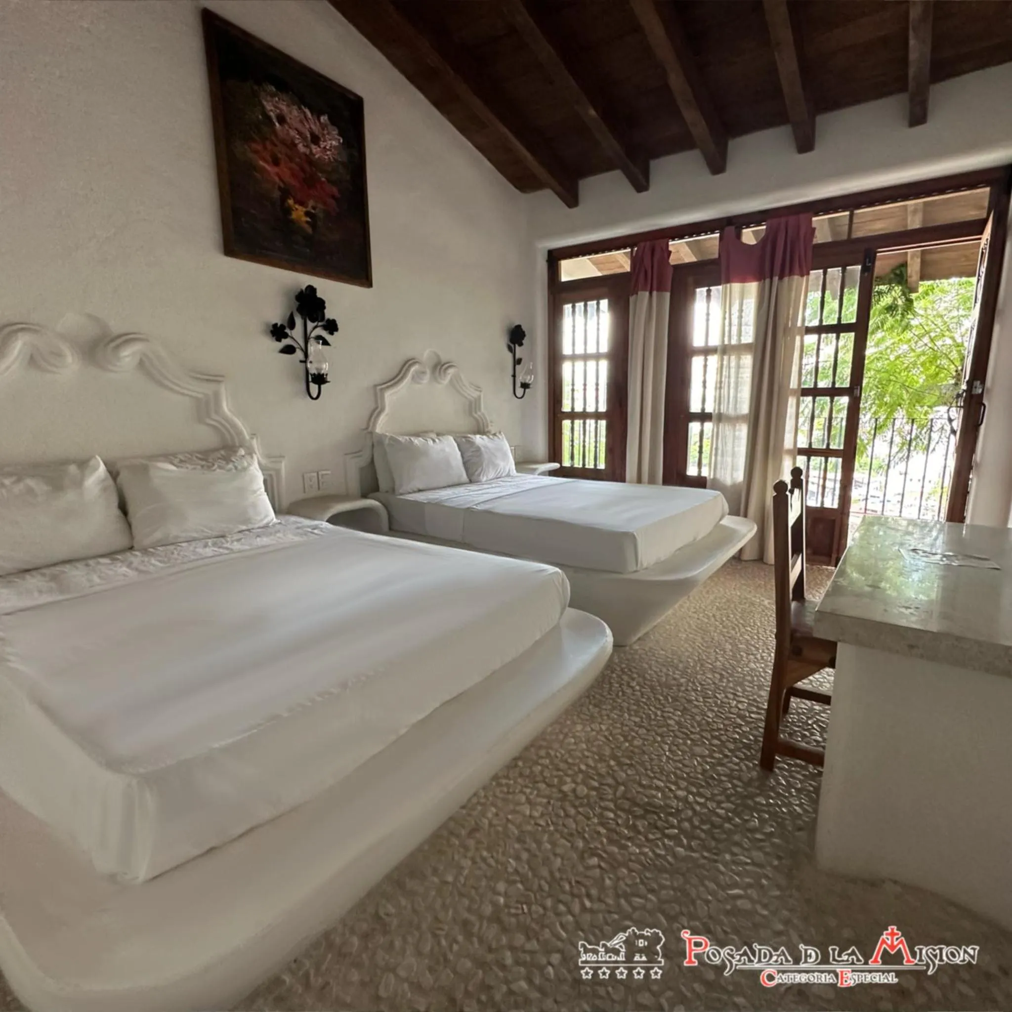 Bed in Posada de la Mision, Hotel Museo y Jardin