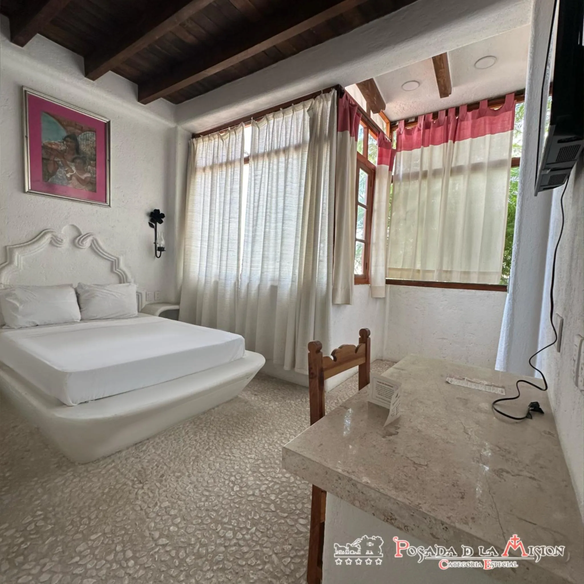 Bed in Posada de la Mision, Hotel Museo y Jardin