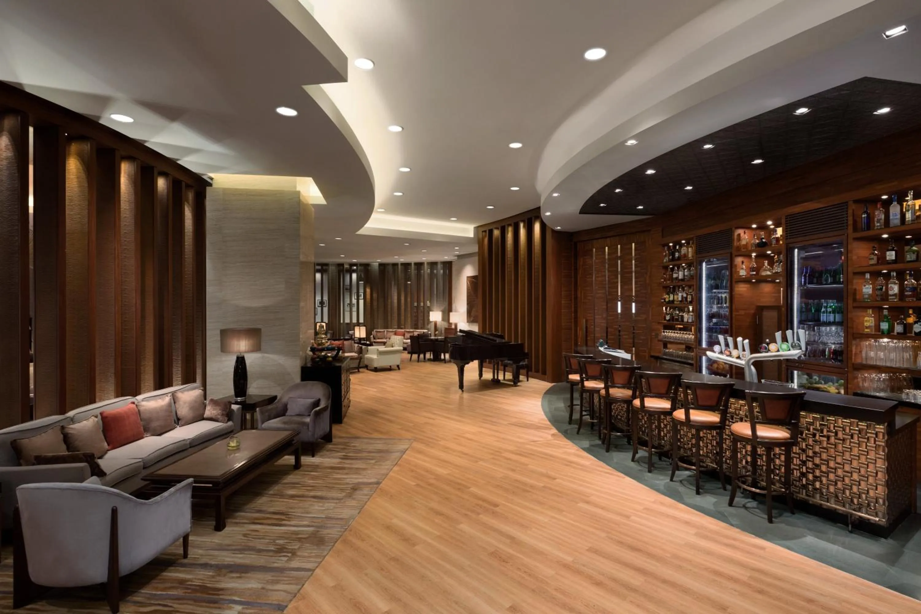 Lounge or bar in Kerry Hotel Pudong, Shanghai - Indoor Connecting to Shanghai New International Expo Centre