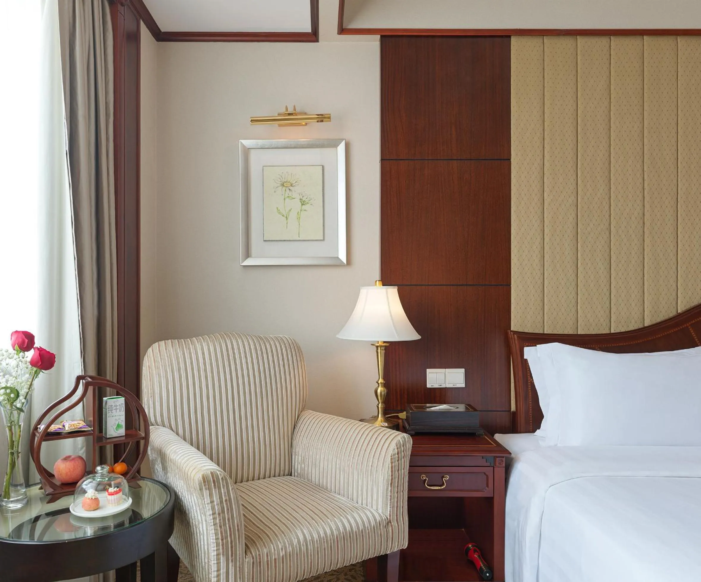 Seating area, Bed in Regal Palace Hotel