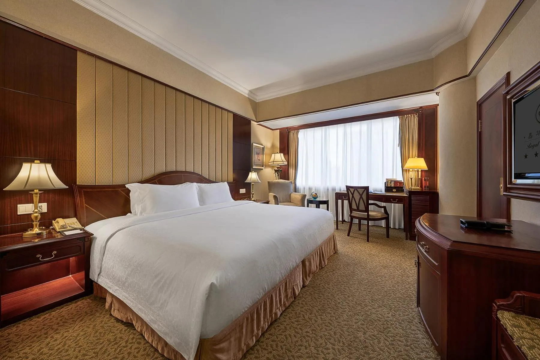 Bed in Regal Palace Hotel