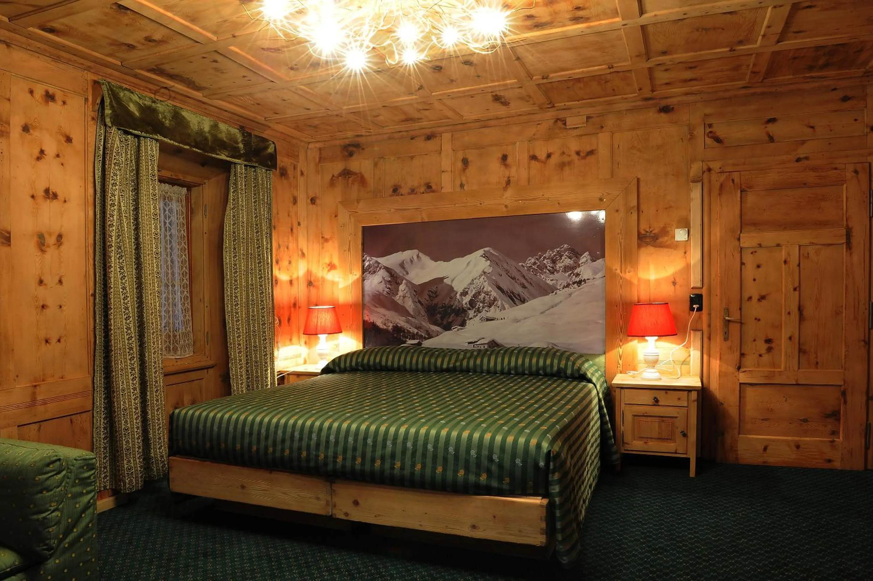 Bed in Hotel Alpina