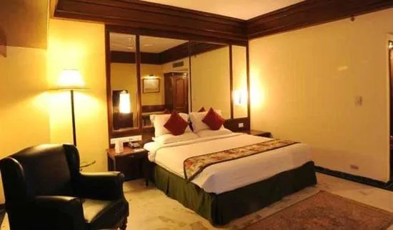 Bed in Hotel Vikrant
