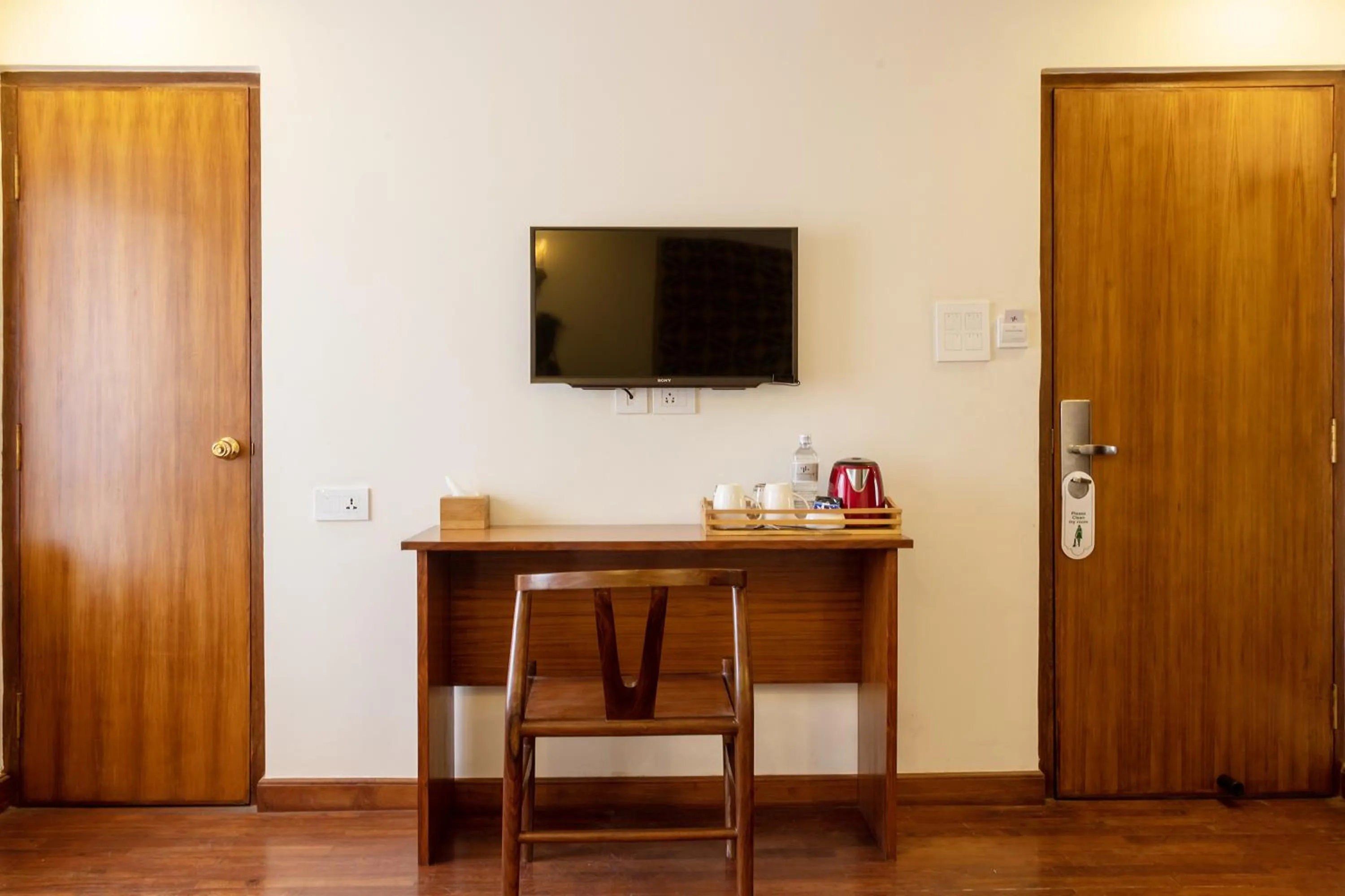 Communal lounge/ TV room in Timber House by Tara Group